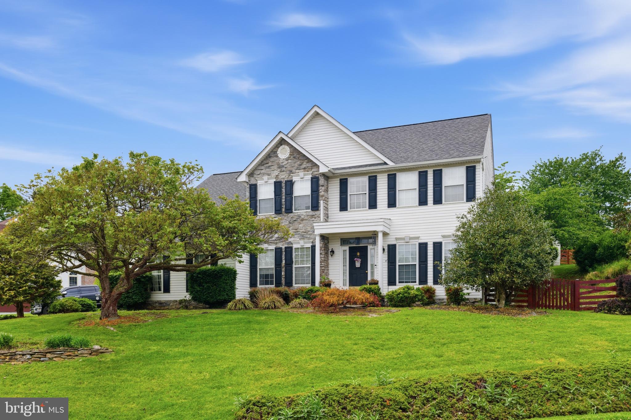 Welcome to Foxleigh Meadows! This stunning home is in a fantastic location! Imagine hosting friends in the beautifully remodeled gourmet kitchen with granite countertops and a wine fridge, or unwinding on the cozy enclosed sunroom while enjoying views of the lush, professionally landscaped lawn and charming terraced flower beds. Inside this home, you'll find open spaces, designer paint colors, and gorgeous finishes.  Built-in bookcases in the office/den and the family room. The gas-burning fireplace is framed with bookshelves.  Formal Living Room, Dining Room, and 2-story foyer. The upper level offers 4 spacious bedrooms, including an oversized Master suite with a sitting area, a luxury master bathroom, and his-and-hers walk-in closets.  The lower level is fully unfinished and has a bathroom rough-in. No HOA and no city taxes.