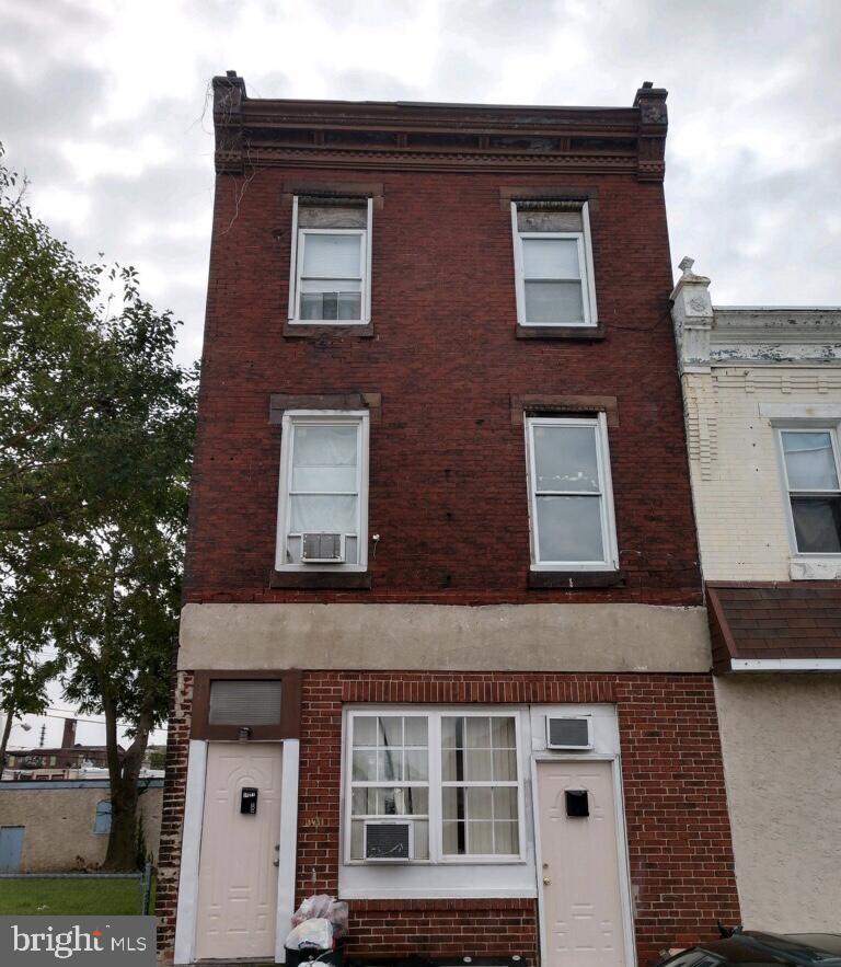 Large street to street property with rear garage.   Non conforming five unit building with three efficiencies and two 1 bedroom apartments.  One unit is vacant.  $2985 total income when occupied.  24 to 48 hour notice required for all showings.  Separate electric.  Sold in as is condition.   Buyer is responsible for U&O.