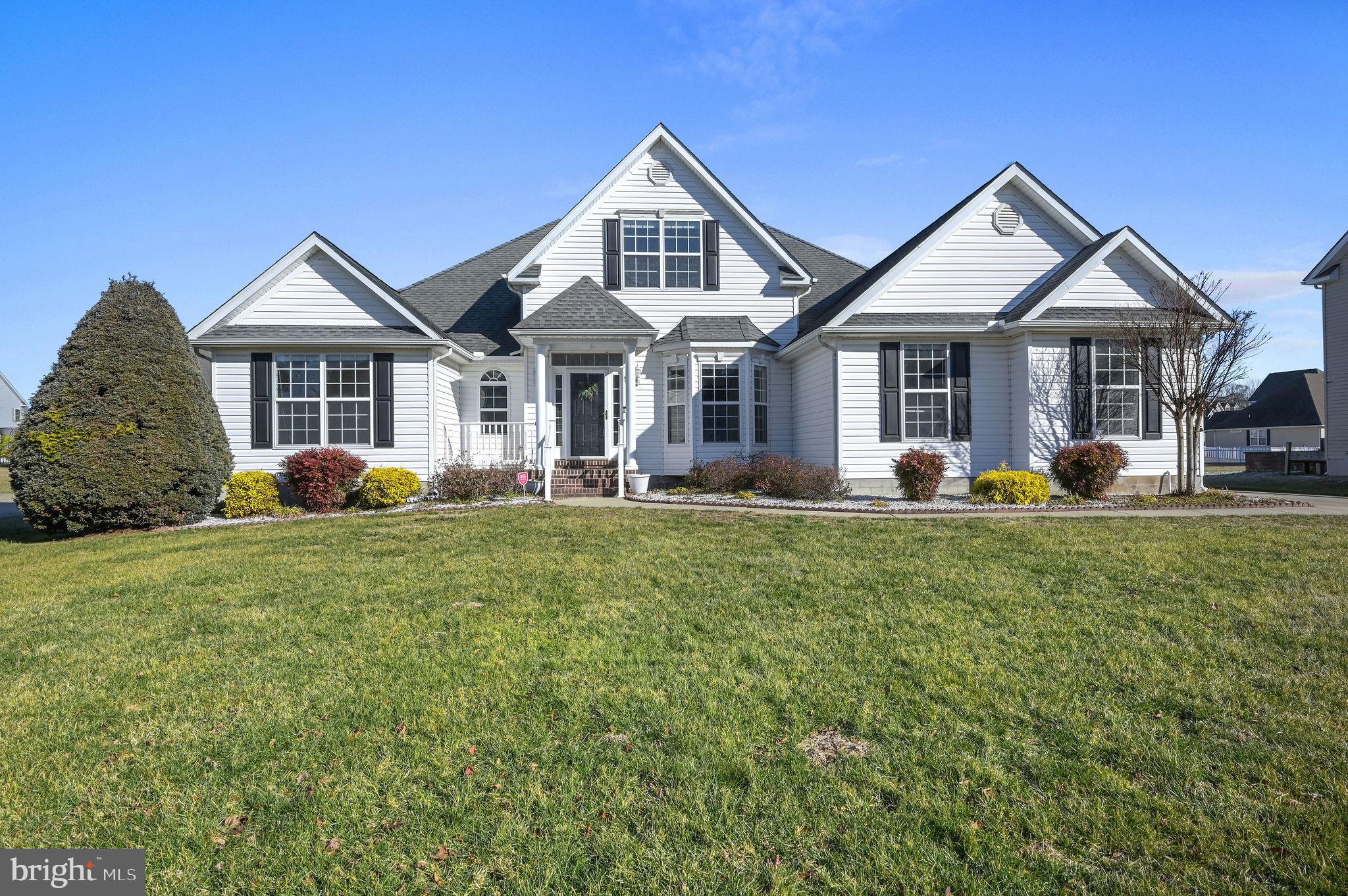 Welcome Home to 457 Orchard Grove Way.  This delightful home located in the Caesar Rodney School District and in the beautiful development of The Orchards is ready for its new owner.   As you step inside the Foyer you are greeted by the formal Dining room with beautiful moldings and a large bay window.   Hardwood Flooring throughout the First Floor and Ceramic Tile in all the Baths.  Your Livingroom back wall has large, oversized windows viewing the private back yard.  Very large room for Family pleasure and wonderful for entertaining.  The Kitchen has oversized 42" cabinets with beautiful moldings and extra built in cabinets for storage or can be used as a buffet for parties.  Stainless Steel Appliances and Lovely Oversized Tile Flooring.  Sliding door takes you to the sunroom off the kitchen.  Enjoy your morning coffee overlooking your back yard.  Screened in porch is also off the Sunroom with access to basement steps.  The Back yard is Fully fenced with White Vinyl fencing, has a storage shed and mature trees and plantings, The Primary Bedroom has ample space to accompany a large bedroom suite.  Two walk- in closets.  The Primary Bath has been recently updated and has a walk in Tub with safety bars, Large Shower and double vanity.  Bedrooms on the first floor on the opposite side of the house are largely sized with ample closet space.  Upstairs there is a bonus room with endless possibilities.  Make it a fourth bedroom, Office, Childs Playroom, or Mancave.  A large attic is floored for great storage options.  The basement has a large, finished room with walk out steps to screened in porch.  The unfinished systems room has extra space for storage.   Laundry room is located on hall to garage.  Front End Loading washer and dryer with Storage cabinetry and utility tub.  Garage has shelving and Storage a Freezer and Extra refrigerator.  Appliances being sold as is in the garage.  Both functioning, New A/C unit and Hot water heater within the last 3 years.  Fresh paint throughout.  Driveway extension to allow ample parking Irrigation System runs off private well.  Close to all commuter routes, Restaurants, Shopping, Beach, and Dover Air Force Base.  Call and schedule your tour today and make this lovely home yours.