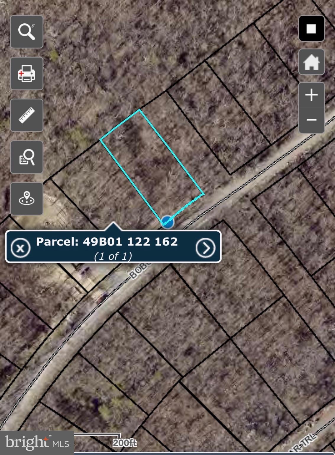 Perched atop Great North Mountain, this beautiful wooded lot offers the potential for stunning westerly mountain views. Just under half an acre, the property offers a small driveway already cut in and a level homesite area, an ideal setting for your future mountain retreat, whether a chalet, cabin, or full-time residence.

Surrounded by nature, this peaceful lot provides elevated views while still being approximately 20 minutes from Winchester. Road access is well maintained, with hard surface roads most of the way.

A previous septic approval for a 4-bedroom Puraflo system (2006) is available in the documents; however, buyers should verify current requirements and updates with the county. Don’t miss the opportunity to own a mountaintop homesite in Shawneeland with incredible potential.