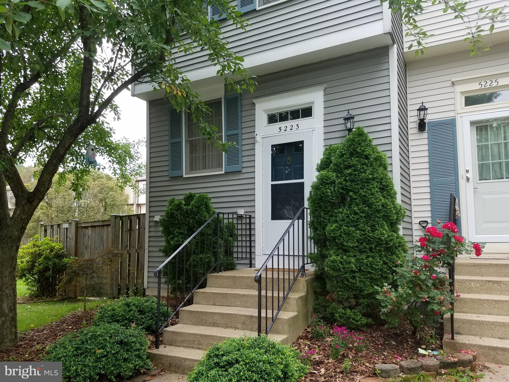 Corner unit with a beautiful back yard.  Priced to sell.