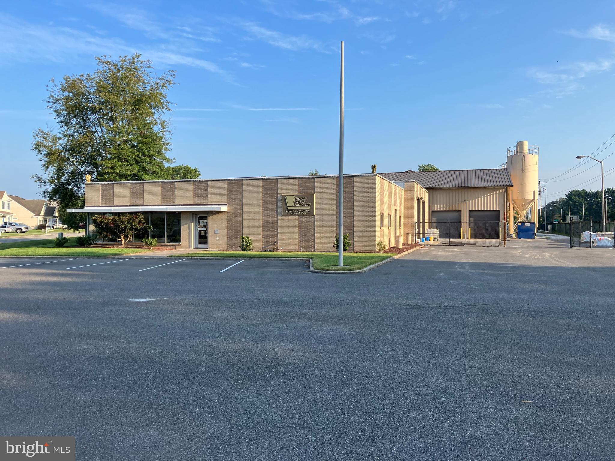 This sale price includes the real estate only at 173 Sassafras St,  Millington, MD. There's 19,656 SF of office and production/warehouse area in three structures on 1.92 acres of land. Light Industrial Zoning allows for many uses. Approximately 6,000 SF of office area plus lab space and about 13,656 SF of production area in two steel buildings. The property has public water and sewer, 208V - 3 phase electric service, and high speed internet.  Security fencing around the warehouse/production area. Possible seller financing. This property is in an excellent location within a two hour drive to Baltimore, Washington DC, Philadelphia, Wilmington, and more.