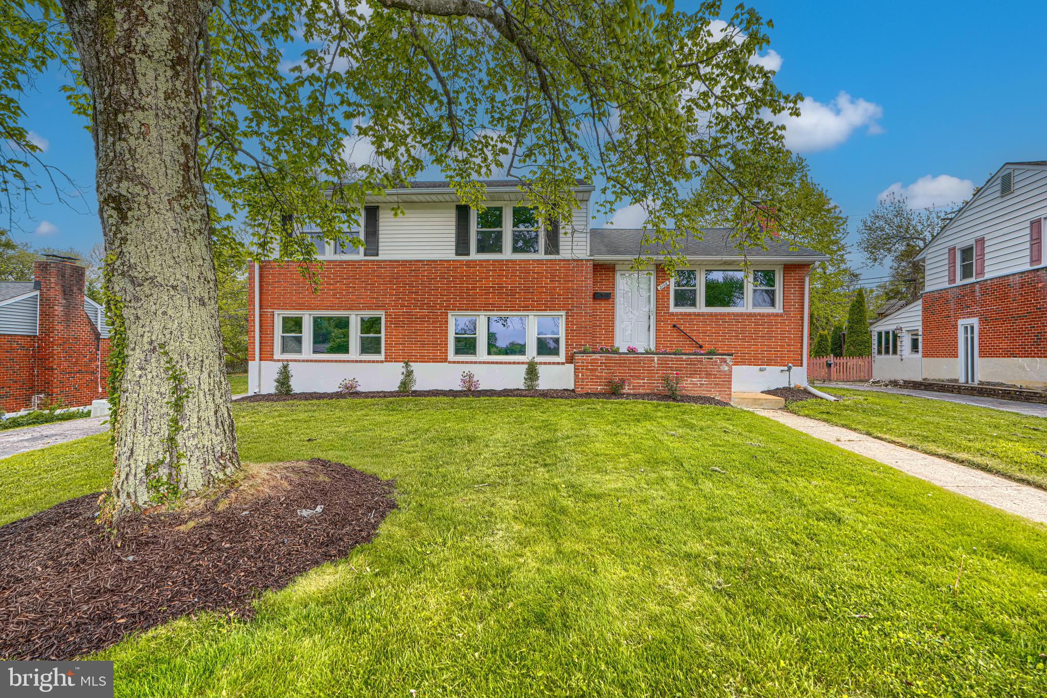 Discover the charm of this beautifully updated split-level home in the desirable Suburban Greens neighborhood. With a major renovation completed in 2026, this residence seamlessly blends modern comforts with classic appeal. Step inside to find a spacious layout featuring three inviting bedrooms and two full bathrooms with upgraded tub shower and a walk-in shower, perfect for relaxation. The heart of the home is the combination kitchen and dining area, equipped with upgraded countertops, breakfast bar, custom-made white cabinetry and stainless-steel appliances, making it a culinary haven. The family room, conveniently located off the kitchen, is perfect for gatherings. Natural light floods through double-pane windows, while new luxury vinyl plank and ceramic tile flooring add a touch of sophistication throughout. The living room with high cathedral ceiling and wood burning fireplace, provides a warm comfortable space especially during winter, while the partially finished basement equipped with heating and windows, offers additional potential for customization. Outside, the property is enhanced by thoughtful landscaping, a level rear yard, and a partly wooded front yard, creating a serene environment. Other exterior features include an enclosed screened porch that invites you to enjoy the outdoors year-round, and a private, paved driveway, making parking convenient. This home is not just a place to live; it's a lifestyle waiting to be embraced. Don't miss your chance to make this stunning property your own! Note - Some images in this listing have been virtually staged.