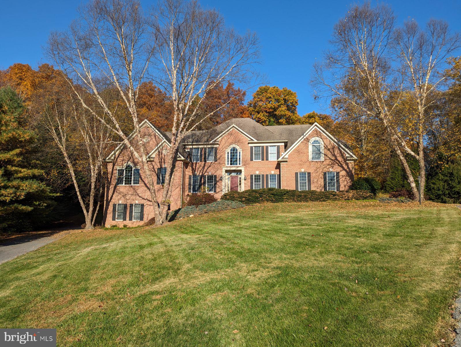 Wonderful Wellington.  Welcome to this classic one of a kind home.   Situated on 1.4 acres and plenty of space between neighbors, this is the place to call home.  It's a picture perfect neighborhood where everyone waves hello.  Minutes to Cattail Creek Country Club.  Four bedrooms upstairs with an additional bedroom on the main level.  Beautiful hardwood floors, 2 story foyer and a 2 story family room.  The room over the garage is simply awesome.  Three fireplaces. Fully finished basement with a full bathroom.  Extensive hardscaping in the backyard.  A 3-car garage with a lift and and another 2-car garage on the other side of the home.  Community Title Preferred. Truly a must see!!