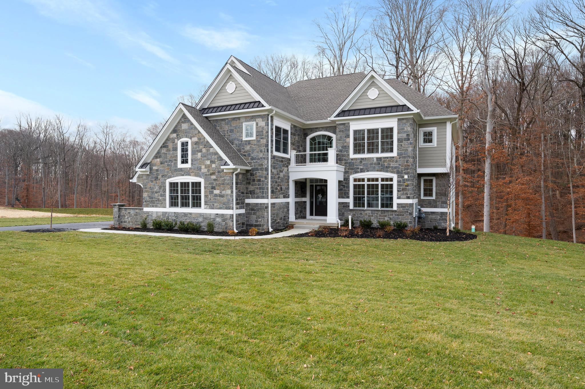 Incredible Location, Approximate One Acre Home Sites, Well Designed Floor Plans, and "Dare to Compare" Included Features - Welcome to the new community "Village of Four Seasons"!  Construction is underway on a number of new homes in this peaceful enclave of only 38 residences with close proximity to Philadelphia  Airport, major routes, fine dining, and shopping, and neighboring the scenic Springton Reservoir!   The popular Bellflower Model offers smart architectural design for easy entertaining and everyday living with a long list of included appointments such as Stone & James Hardie exterior elevations, rich interior moldings, wide engineered hardwood floors, side sweeping staircase, open balusters & railing, solid interior doors, insulated interior walls, finished Lower Level with daylight windows, walk out entrance and full Bathroom and the list goes on in every one of our homes!!  
Step into our Foyer and be welcomed with beautiful windows and natural light that allow the gorgeous outside landscape to follow you inside!    Once inside, the Dining Room will delight you with its sophisticated tray ceiling and adjoining Butler's Pantry, ready to be the serving station for your next get together!  The Gourmet Cook's Dream Kitchen will WOW you with an expansive 10’ Arched Center Island, Tall Painted Cabinets with Crown Molding to the Ceiling,  Undercabinet LED Lighting,  Quartz Countertops, equipped with the Monogram Stainless Steel Appliance Package, including Double Ovens, Built in Microwave Oven, Stainless Steel Dishwasher, 5 Burner Gas Cooktop with Grill, Stainless Steel Hood, all overlooking a cozy Breakfast Room with a rear glass wall.   On game day, your guests will enjoy watching their favorite team in the adjoining Two-Story Family Room, with a handsome fireplace and window wall.   The First Floor also features a  Guest Suite or Home Study with a large Walk-In Closet and Dual Access Full Bathroom.  In addition, there is a convenient Mudroom Hall giving access to a Covered Outside Entrance, Three Car Garage, Coat Closet, and an Additional Walk-In Closet sized for a possible Future Elevator.    The Second Floor offers a great design with a Balcony leading to the luxurious Owner’s Suite with a Bay Window looking onto the Rear Grounds, Volume Tray Ceiling, Dual Walk-In Closets, and a Spa Bathroom Retreat with a Free-Standing Soaking Tub, Spacious Shower with Frameless Shower Door and separate Wall Vanities and Tower Cabinets.  Three additional generously sized Bedrooms, Two Full Bathrooms, and a conveniently located Laundry Room outfitted with Cabinets and Utility Basin complete this level!   Please note the Total Square Footage includes over 1,300 square feet of Lower-Level Finished Space with a Full Bathroom, Storage Closets, Daylight Windows, and a Walk-Out Entrance with Patio. Home sites are 40,000 square foot minimum and all lots are subject to lot premiums (minimum $50,000).  We are Open by Appointment, so please call the Sales Manager for details and to schedule your tour!  Public Water, Public Sewer, and Natural Gas.  Photos are of the model home and show options.  Bellflower Model Home address is 202 Bellflower Lane, Newtown Square, PA  19073.