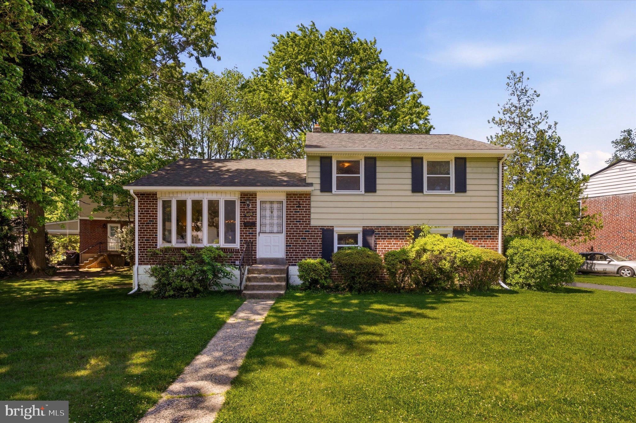 Welcome to 400 Rittenhouse Circle! This well-maintained 3-bedroom, 1.5-bath split-level home on a large.33 Acre lot has been lovingly cared for by the same owner since 1980 and offers a fantastic opportunity to update and personalize a home in a sought-after Havertown location. The bright main level features a spacious living room with a large bay window, a dining room, and a kitchen ready for your vision. Recently refinished hardwood floors extend throughout the living room, dining room, and all three bedrooms on the upper level. Upstairs, you'll find three generously sized bedrooms and a full hall bath. The lower level offers additional living space with a comfortable den featuring new carpeting, along with a powder room, laundry area, utility space, and outside access to the driveway. Situated on a desirable corner lot with a large side yard, this home is ideally located within walking distance of Lynnewood Elementary School and the Haverford YMCA. Enjoy easy access to shopping, dining, and everyday conveniences at Manoa Shopping Center and along Eagle Road. Filled with natural light and solidly maintained over the years, this home is ready for its next owner to bring their ideas and make it their own. Don't miss this opportunity to own in one of Havertown's most desirable neighborhoods!