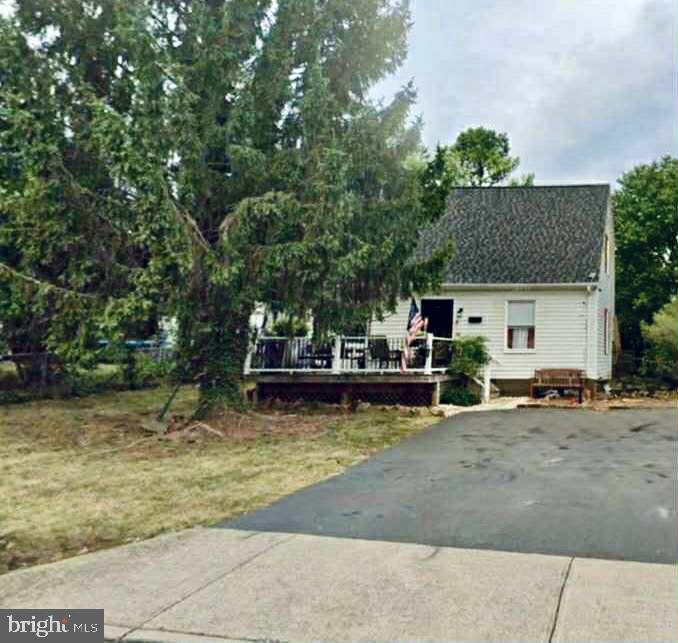 Charming Cape Cod on private town lot with convenient location to town shopping, restaurants, baseball park, Main Street and public pool.  Fenced in back yard with large deck and front porch.  Huge shed shop included in rear yard.!  Home offers spacious living room, main floor Primary bedroom and bath.  Laundry on Main floor.  Stainless steel appliances in kitchen.  Upstairs has 2 spacious Bedrooms with high ceilings  and Bathroom.  Needs work!  SOLD AS!