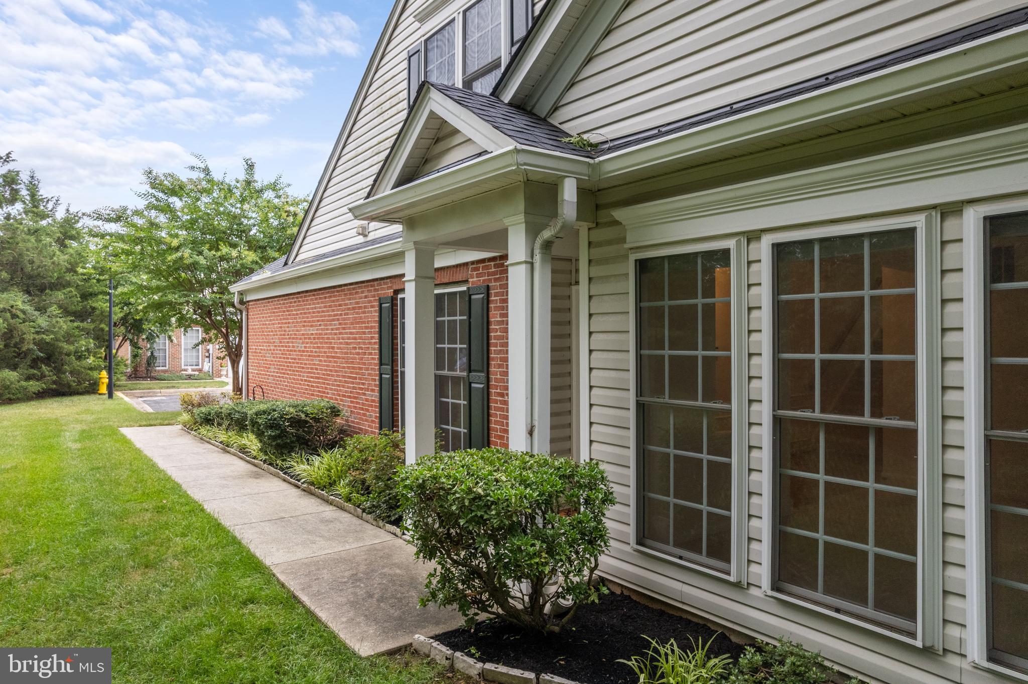 This end-unit, move-in-ready home with a 1-car garage and driveway, is perfectly tucked away in one of the most peaceful locations in the sought-after 55+ community, The Villas of Rock Oak.
Designed with everyday ease in mind, the main level offers an open concept combined living & dining room, kitchen w/dining bar, spacious owner's suite complete with a large walk-in closet and private en-suite bath with dual vanities, soaking tub and separate walk-in shower. A second main level bedroom/study, full bath and laundry room completes the first floor.  Step outside to the private patio overlooking mature trees, where you can enjoy your morning coffee while watching birds and deer!
Upstairs offers a private retreat with a third bedroom, walk-in closet, full bathroom, and a generous recreation area. This home feels like a private escape while still offering the warmth and connection of a wonderful, welcoming community.

Located just minutes from the O'Malley Senior Center and an abundance of local shopping and dining including the Piney Orchard Marketplace as well as the Waugh Chapel Town Center. Location allows easy access to major commuter routes including 100, 32, 95, 97 and is convenient to BWI, Baltimore/Annapolis/DC and the MARC train station.