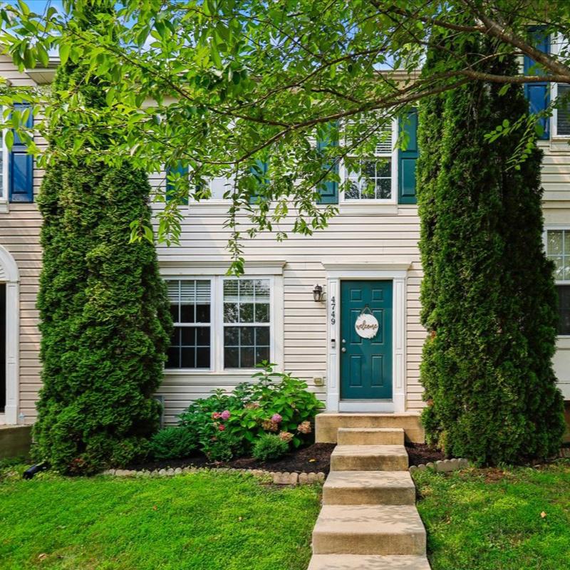 Nestled in the charming Holly Woods community, this delightful townhouse offers a perfect blend of comfort and style. This home features a fully finished basement with a cozy fireplace! Step inside to discover a warm and inviting atmosphere. Enjoy your morning coffee in the breakfast area, where natural light pours in, creating a cheerful start to your day. Or sit on the new back deck and enjoy the fenced-in yard looking out onto trees, perfect for unwinding after a long day. This home boasts three spacious bedrooms and four bathrooms, ensuring convenience for both residents and guests. The primary bathroom was just updated! The lower floor laundry adds to the ease of daily living, making chores a breeze. Don't miss the opportunity to make this inviting townhouse your own home sweet home!