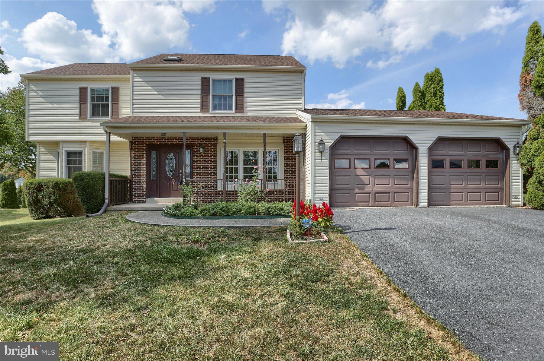Come make this well kept two story traditional house yours.  Conveniently located in Camp Hill off of Erford Rd, you'll be just minutes from everything you need. On the main floor, you'll find dining room with hardwood floors and on open kitchen. Off the kitchen is a mud room, a half bath/laundry room, and access to the two car garage. There is a living/sitting  room as well as a large family room that features a natural gas fireplace. You can also enjoy the insulated temperature controlled sunroom all year long. Up the stairs, you'll find all the master bed/bath, three more large bedrooms, and the main full bath.  Down the stairs, the spacious basement is ready to be turned in extra living space, game room, or storage.