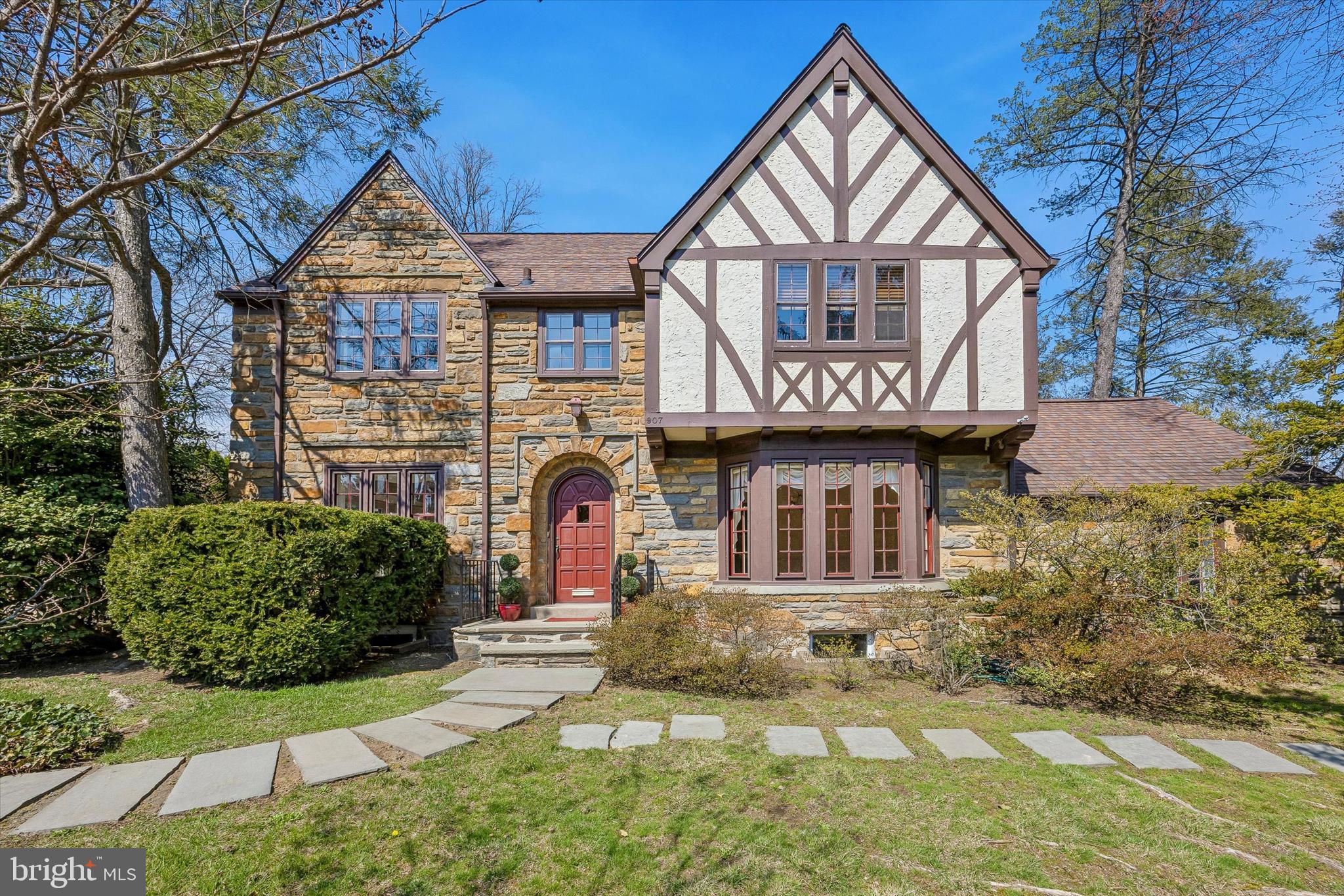 Welcome to this classic 4 bedroom home set on a quiet tree lined street in the sought after Shortridge neighborhood.  A winding flagstone walkway leads to a charming front entrance then into rooms filled with wonderful natural light from large windows, skylights and a southern exposure.  To the left, the expansive Living Room features a wood-burning fireplace and flows into a spacious Family Room addition with a tray ceiling, custom built-ins and French style doors leading to a slate patio and rear yard.  Adjacent is a sizeable Breakfast Room with additional cabinetry and closet along with Mudroom area that provides access to the driveway and garage.  The Kitchen with granite countertops, a gas cooktop and double ovens connects to the formal Dining Room and back to the front entrance hall. This first-floor plan creates great flow for everyday living and entertainment with multiple connected rooms as well as a center hall from front to back with Half Bath, coat closet and basement access.  Upstairs, the second floor offers a comfortable and functional layout with a large Primary Bedroom with newer Full Bathroom, walk in closet and bonus mini-split HVAC system, Second Bedroom with Full Bathroom (currently also accessed from primary bedroom), two additional Bedrooms, third Full Bathroom, stackable washer/dryer and access to a walk-up floored Attic from the hallway.  The partially finished Basement provides excellent potential for additional living space and includes a second washer and dryer as well as direct access to the 2 car Garage.  With hardwood floors throughout, bay windows with deep sills, abundant storage and a whole-house generator, this property offers the perfect blend of character and convenience - all within walking distance to both Wynnewood and Narberth shopping, dining and trains to Center City as well as the beautiful Shortridge Park with stream, sledding hill and dog friendly area.