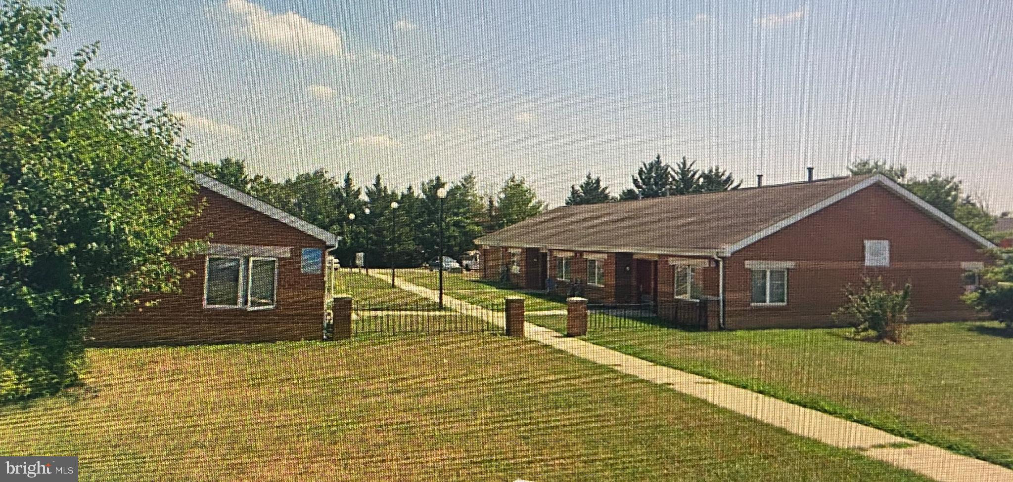 Great investment. The solid brick construction ensures durability and low maintenance, appealing to savvy investors seeking long-term value. Equipped with essential appliances including a refrigerator, stove, and water heater, this property is ready for immediate rental income. These appliances not only enhance tenant satisfaction but also reduce turnover rates, maximizing your return on investment. The common laundry facilities add an extra layer of convenience, making it an attractive option for potential renters. With a generous lot size of 0.99 acres, there's ample space for future enhancements or expansions, allowing you to increase rental income potential. The property's architectural style and design offer a unique charm that stands out in the market, appealing to a broad range of tenants. Parking is hassle-free with designated parking lots, a significant advantage in urban settings. This feature, combined with the absence of a pool, translates to lower maintenance costs, ensuring your investment remains profitable. Investing in this property means securing a reliable income stream in a desirable location. Don't miss out on this chance to capitalize on a property that promises both immediate and long-term financial benefits.