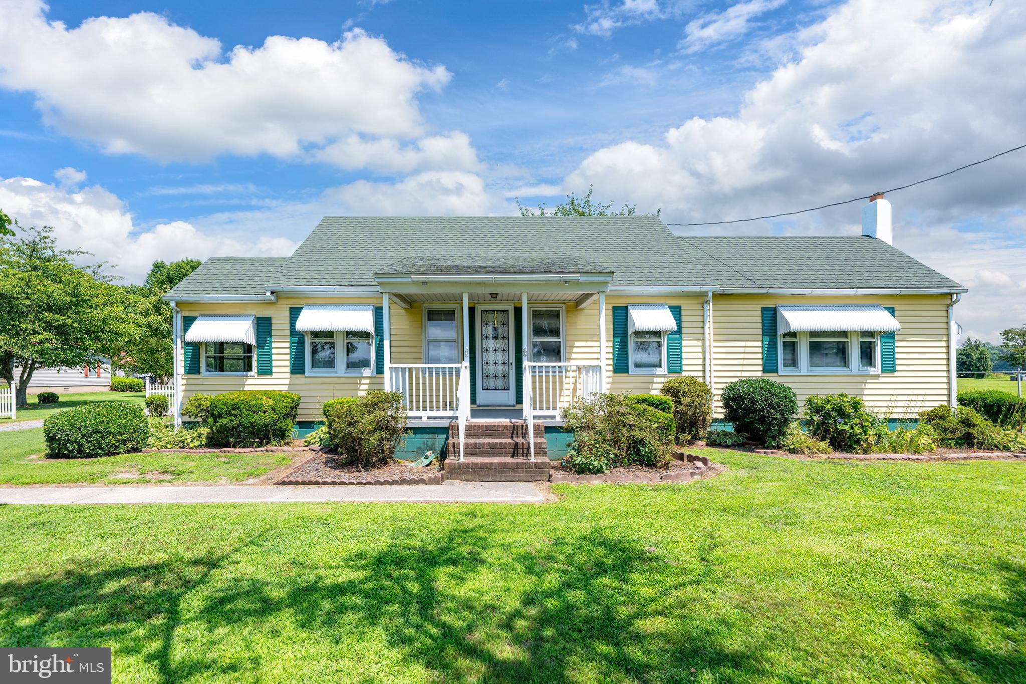 Charming 2-Bed + Loft Bungalow on 2.44 Acres – Room to Grow, Garden & Create Your Dream Lifestyle! Step into the perfect mix of charm, space, and opportunity with this Craftsman-style bungalow, beautifully set on 2.44 peaceful acres. Whether your vision includes a homestead, lush gardens, expansion project, or private retreat, this property gives you the space and freedom to make it happen. Originally built in 1957 and lovingly maintained, this home greets you with warm character and a functional layout designed for comfortable living. Inside you’ll find:

Bright, connected living spaces with an easy flow between the dining room, family room, and kitchen—ideal for gatherings big or small.

A welcoming kitchen that opens directly to the family room, so you can cook, chat, and entertain all at once.

A nostalgic wood fireplace (non-functioning) that makes a charming focal point and restoration opportunity.

Two main bedrooms, plus a versatile loft that works perfectly as a 3rd bedroom, home office, or hobby space.

A spacious sunroom overlooking the backyard and tree line—perfect for morning coffee or evening sunsets.

A full first-floor bath with a tub-shower combo adjoining a large laundry room, offering space to expand into a bigger bath if desired.

Ceiling fans throughout for year-round comfort, and possible original hardwood floors hiding under the carpet.

Outside is where this property truly shines:

Detached garage with extra storage.

Generous driveway parking for guests.

Nearly 2.5 acres for gardening, pets, outdoor living, or future building projects.

From sipping coffee on the porch, enjoying summer breezes in the shade of the mature trees, to hosting gatherings under the stars, you’ll love the peace and privacy of country living—just minutes from town conveniences.

Don’t wait—properties with this much potential are rare! Schedule your showing today and start creating the life you’ve been dreaming of.

Public water is at the road, but not attached to this property. If buyer chose to look into this option it would be at the buyers expense. Property has well in front yard is 118 ft deep. There is also a 750 gal. septic tank located in back yard with a tile leach bed. The approval in 1973 was the system that was built for average daily discharge of 300 gals. a day and is located in back yard over a 100 ft. from water well. The septic is being sold in as is condition and any repairs/replacement would be the responsiblity of the buyer.