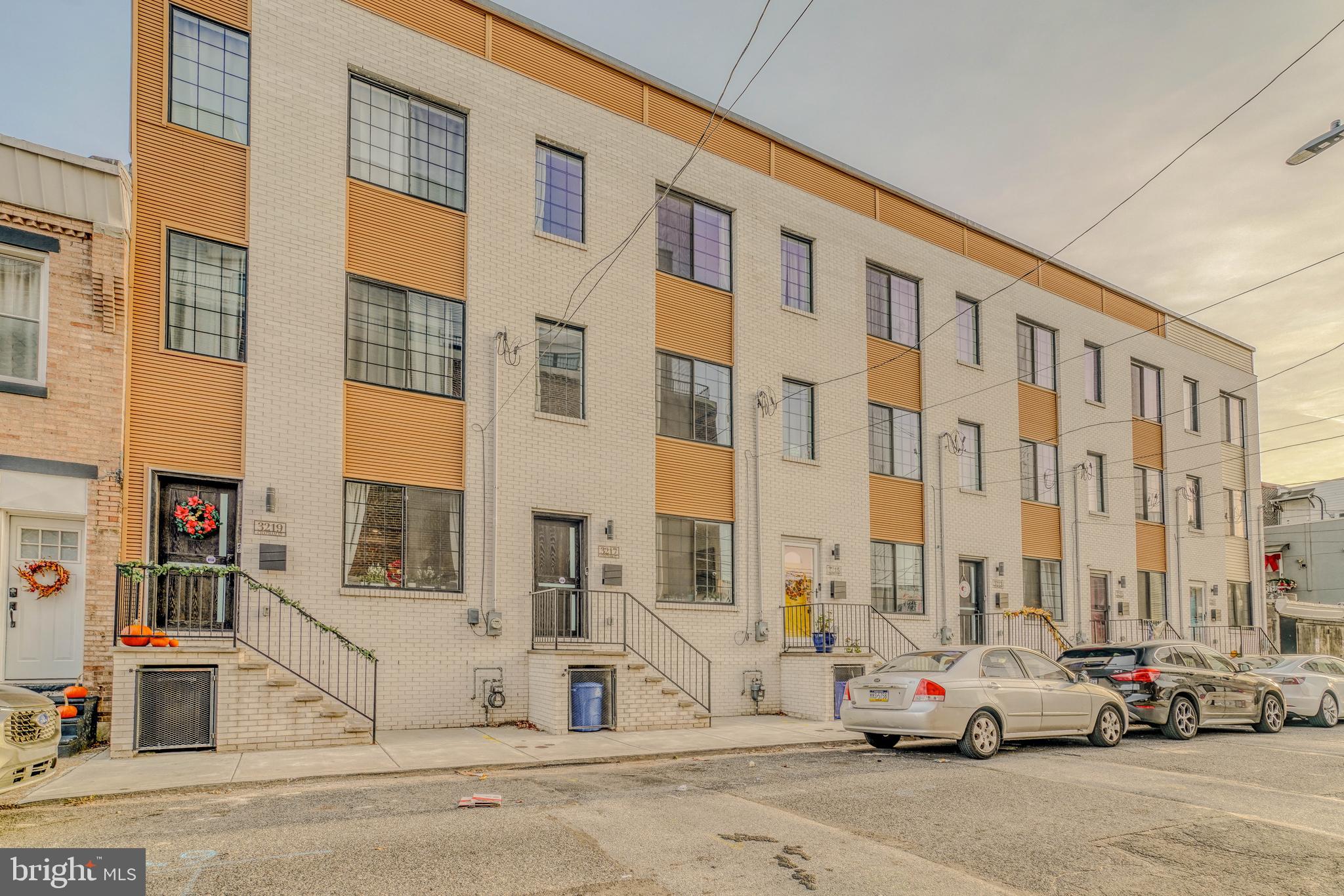 Welcome to 3217 Chatham Street in the heart of sought after dynamic Port Richmond neighborhood.  There may not be another home purchase opportunity in this zip code that offers such a high level of masterful craftsmanship, design creativity and superior finishes through out.  The 2,700 square feet of living space provides for 4 bedrooms, 3 full bathrooms (inclusive of the ensuite spa quality bath in the main bedroom) and a 1st floor powder room.  Whether living daily life or entertaining  family and friends the first floor provides the  generous space of a large living room, dining room with electric fireplace, and a kitchen offering a perfect gathering place complemented by an expansive island shrouded in beautiful quartz that matches the counter-tops. The entertainment journey can continue as you step through the rear sliding door to a surprisingly spacious outdoors fully enclosed 30 foot backyard,  a 12’x12’ concrete patio,  green-space, and a large 10’x12’ pergola.   And if that doesn't completely satisfy your needs for space there is a full finished basement with a full bathroom and multi-purpose rooms that could include a bedroom.  
On the remaining 3 floors of this oversized town home where you'll find a second floor containing two bedrooms at each end of the main hallway that shares the space with the second  floor laundry 
and a beautiful ceramic tiled full bathroom.  Ascending the stairs to the next level discover the owners suite occupying the entirety of the 3rd floor where you are met by a wet bar with cabinetry and a wine fridge.  Beyond the magnificent main bedroom you will experience his and hers walk-in closets and a 72 square foot ceramic tiled rain shower and soaking tub  walk-in spa room.  A large double sink vanity in the bathroom area provides great storage.  To top it all off , literally, is a fiberglass roof deck providing a relaxing area  with beautiful skyline views and city scapes, day and night
The home comes with an entertainment package which includes 1st floor, Master Bedroom, Master Bathroom, Rooftop speakers as well as built-in security alarm with cameras and doorbell. 
This home, newly constructed just 3.5 years ago provides the ongoing transferable real estate tax abatement with 6.5 years remaining.  
This spectacular home is conveniently located to Fishtown,  Northern Liberties and all top restaurants, entertainment venues, parks and vibrancy that Philadelphia provides.