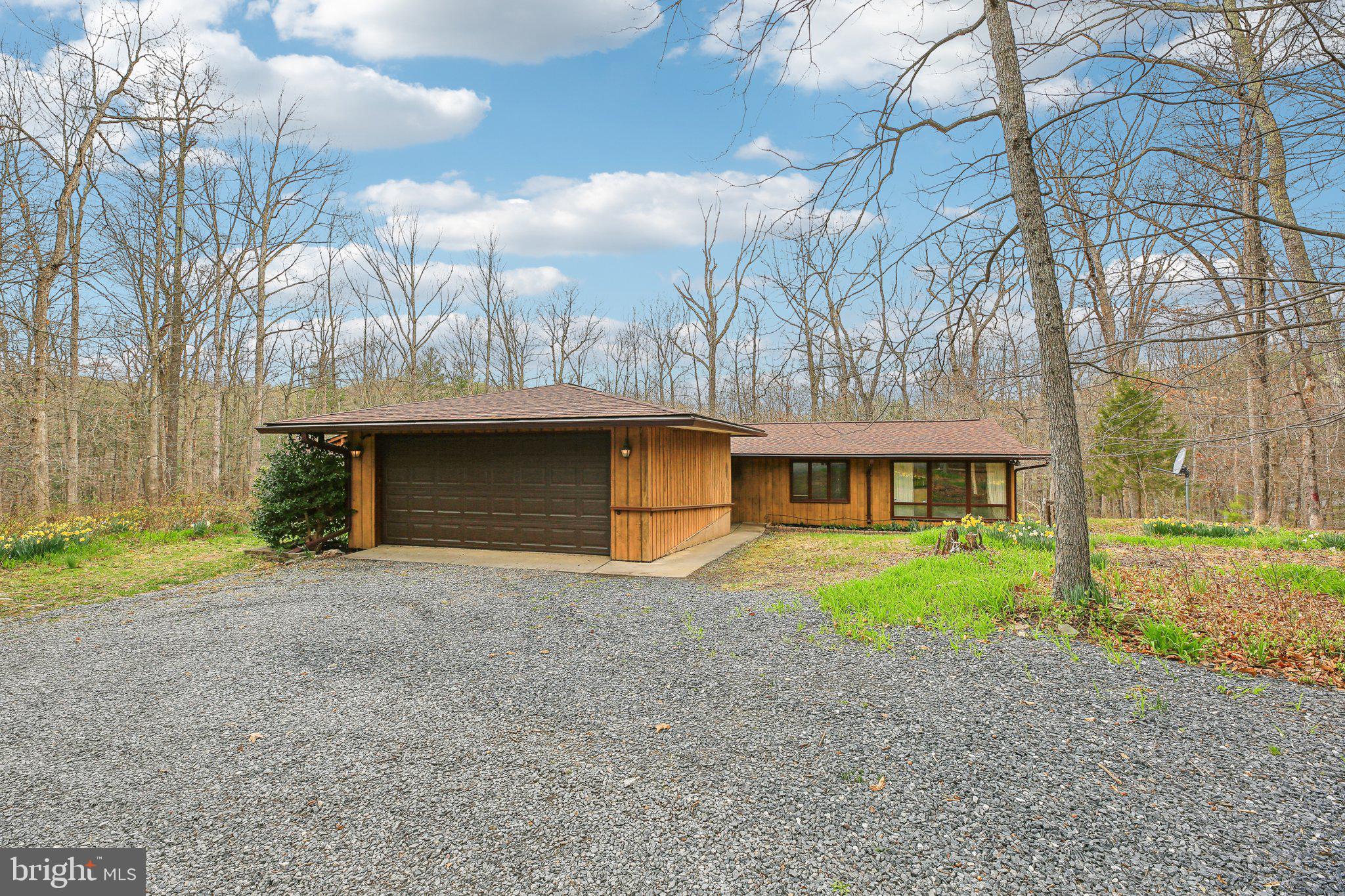 Welcome to this spacious 4-bedroom, 2 full bath, and 1 half bath contemporary home set on 5 picturesque acres. This home offers endless potential for the right buyer, with a layout that includes a large living area, ample bedrooms, and generous outdoor space perfect for privacy or recreation. The property also features a detached garage/barn with providing additional storage or workspace.

The master bathroom has been gutted and is ready for your personal touch, allowing you to create the perfect retreat. While the home is in need of some improvements, this presents an excellent opportunity for those looking to invest in a property that can be transformed into their dream home.

Please note that this home is not eligible for traditional financing and will require alternative financing options. With a little vision and effort, this property has the potential to be a truly unique and customized living space. Don’t miss your chance to make this property your own!
