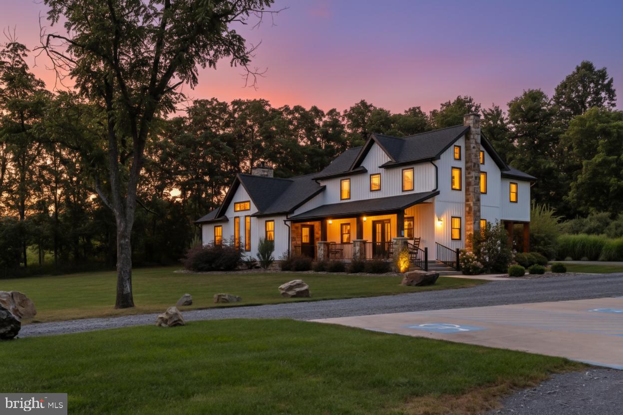 Welcome to Stone Valley Estates, where the ridgelines of Huntingdon, PA meet timeless architecture, meticulous detail, and a thriving event business ready for its next chapter.

From the moment you arrive, the scene plays out like a film — rolling fields, panoramic mountain views, and endless possibility. At the heart of the property stands a mid-1800s barn, restored with extraordinary care to preserve its authentic character. Step inside and you’re transported back in time — the warmth of original beams, the charm of history in every board — yet it’s designed to host up to 240 guests in comfort. Outside, an expansive deck captures sunset views, and the reimagined corn crib serves as a one-of-a-kind ceremony site where a natural stream winds past, adding a storybook backdrop. With 126 acres to work with, the potential for more is limitless.

Every element is built to commercial specifications — from climate-controlled luxury bathrooms to robust septic and water systems. The farmhouse, remodeled in 2020 after an earlier 2019 renovation, retains its original design and classic character, yet inside it delivers every modern luxury. From the gourmet kitchen with massive island and granite counters to the bridal suite, spacious living areas, and top-of-the-line finishes, every detail shines. In the main entertaining/events room, a breathtaking 12-foot stone fireplace is the centerpiece. Just outside, a beautiful timber-frame pavilion crafted from rough-cut timber, with stamped concrete floors, built-in grill, and sink, extends the gathering space.

Up the lane from the main estate, a second residence — a 2-bed, 2-bath home — offers flexibility as a rental, guest space, or private retreat. Just beyond, a woodland fire pit strung with warm Edison lights creates a magical after-dark gathering spot. This area also has two large storage sheds. 

Stone Valley Estates is more than a venue — it’s a proven, thriving business. Over the past few years, they have hosted more than 100 weddings, just completing their 106th wedding. The property boasts a large and loyal social media following, along with countless glowing 5-star reviews, making it a sought-after destination for couples near and far. 

Beyond the residences and venues, you’ll find 60 acres of tillable ground plus 66 acres of wooded, prime hunting land. Multiple fields are perfect for expansion — from another event space to short-term rentals. This is a property where the hard work is done, the vision is clear, and the possibilities are boundless.

Stone Valley Estates is more than land and buildings — it’s a destination, an income source, and an opportunity that rarely comes along. The stage is set. The backdrop is unforgettable. Now it’s your move.