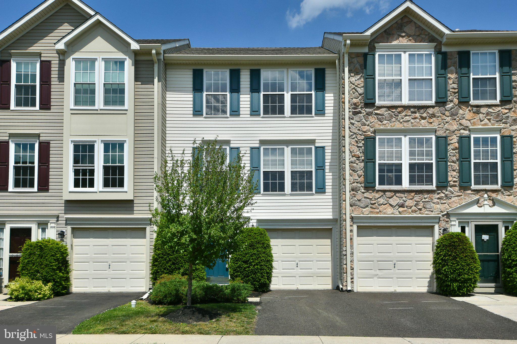 Welcome to 401 Jene Court — a beautifully maintained and freshly painted 3-bedroom, 2.5-bath townhome ready to be your next home in the highly desirable North Wales Terrace at Montgomery Community in Montgomery Township. Thoughtfully designed with warm hardwood flooring throughout, this inviting residence combines comfort, style, and functionality in an exceptional setting. The finished walkout lower level offers a welcoming foyer entry, convenient powder room, interior access to the attached garage, laundry area, and a versatile bonus space perfect for a media room, home office, fitness area, or playroom. Step outside to enjoy tranquil views of the community open space, recreational area, and scenic pond, creating a peaceful backdrop for everyday living. The sun-filled main level features an open-concept layout enhanced by oversized windows and abundant natural light. A spacious living and dining area provides the perfect setting for entertaining or relaxing at home. The beautifully appointed kitchen showcases brand-new stainless-steel appliances, a cozy breakfast area, and sliding glass doors leading to a raised deck — ideal for enjoying your morning coffee or unwinding outdoors. Upstairs, the spacious primary suite offers a walk-in closet with custom built-ins and a private en-suite bath. Two additional generously sized bedrooms and a full hall bathroom provide flexibility for family, guests, or work-from-home needs. Conveniently located near parks, recreational facilities, shopping, dining, and major commuter routes, this exceptional home offers the perfect balance of comfort, convenience, and community living. Don’t miss the opportunity to own this wonderful home in a prime location!