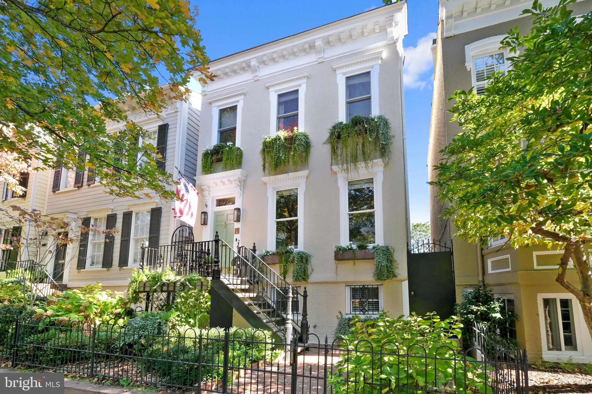 Lovely tree-lined neighborhood block in center of West Village near shopping and best restaurants. House is a partially detached Federal style home originally built in 1850 with 4 BR’s and 4 1/2 bathrooms; all bedrooms ensuite with walk-in closets and hardwood floors throughout. Renovated in 2019-2020, there have been no finishes or amenities overlooked; this house is perfect for a couple who loves entertaining or a larger family. 

The top floor features an optional private suite with large walk-in closet which has a built-in desk/vanity and stacked washer/dryer for owners’ convenience. Primary bedroom also includes access via bathroom to tons of storage space in partially finished attic. The second staircase in the rear of the house gives direct access to two additional bedrooms from family room. Additionally, there is a windowed basement bedroom with private front entrance that could easily convert to a fantastic au pair suite with the basement’s full sized laundry room that is alternately plumbed for a kitchenette. The bright eat-in kitchen on the main floor provides tons of natural sunlight and includes a Wolf range, additional in-wall oven, wine fridge, and wet bar second sink. 

The house has been upgraded throughout with interior and exterior wiring for Sonos Sound System with ceiling speakers throughout first floor and primary bedroom/bath. The house also has been updated with Lutron lighting system, a front-yard sprinkler system, on-demand hot water heater, radiant flooring in primary bedroom and kitchen, and decorator designed window treatments and plantation shutters. The house has a private, fenced front yard featuring custom copper window boxes and bricked rear/side patios, with access to the private one-car garage, which have been meticulously landscaped for outdoor entertaining. An optional 2nd parking spot in the rear alley is available via rental from a neighbor.