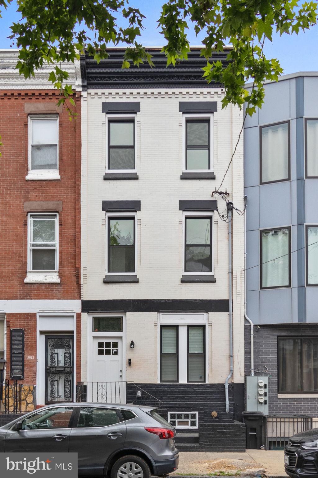 Exceptional investment opportunity in the heart of Brewerytown! Welcome to 2819 W Oxford Street, a fully permitted and legally zoned triplex offering strong income potential and modern turnkey living. Whether you're an owner-occupant looking to offset your mortgage or an investor seeking a cash-flowing asset in one of Philadelphia's fastest-growing neighborhoods, this property checks all the boxes.

The building features three thoughtfully designed units, including two spacious 2-bedroom, 1-bath apartments and one 1-bedroom, 1-bath apartment. Each residence showcases bright, open-concept layouts highlighted by exposed brick accents, soaring ceilings, luxury vinyl plank flooring, and contemporary finishes throughout.

Tenants will appreciate the stylish kitchens complete with upgraded countertops, oversized islands, and premium stainless steel appliances. Additional features include in-unit laundry, energy-efficient ductless mini-split systems, recessed lighting, and updated mechanicals, providing both comfort and convenience.

Extensively renovated from top to bottom, the property boasts a newer roof, windows, electrical, plumbing, HVAC systems, and sprinkler system, offering peace of mind and low-maintenance ownership for years to come.

Outside, a private fenced patio creates an inviting space for relaxing or entertaining, while ample street parking adds everyday convenience. Ideally situated just moments from Fairmount Park and Brewerytown's thriving dining, shopping, and entertainment scene, residents enjoy easy access to Center City, University City, I-76, I-95, and public transportation.

Don't miss this rare opportunity to own a fully updated, income-producing multifamily property in one of Philadelphia's most dynamic and rapidly appreciating neighborhoods.