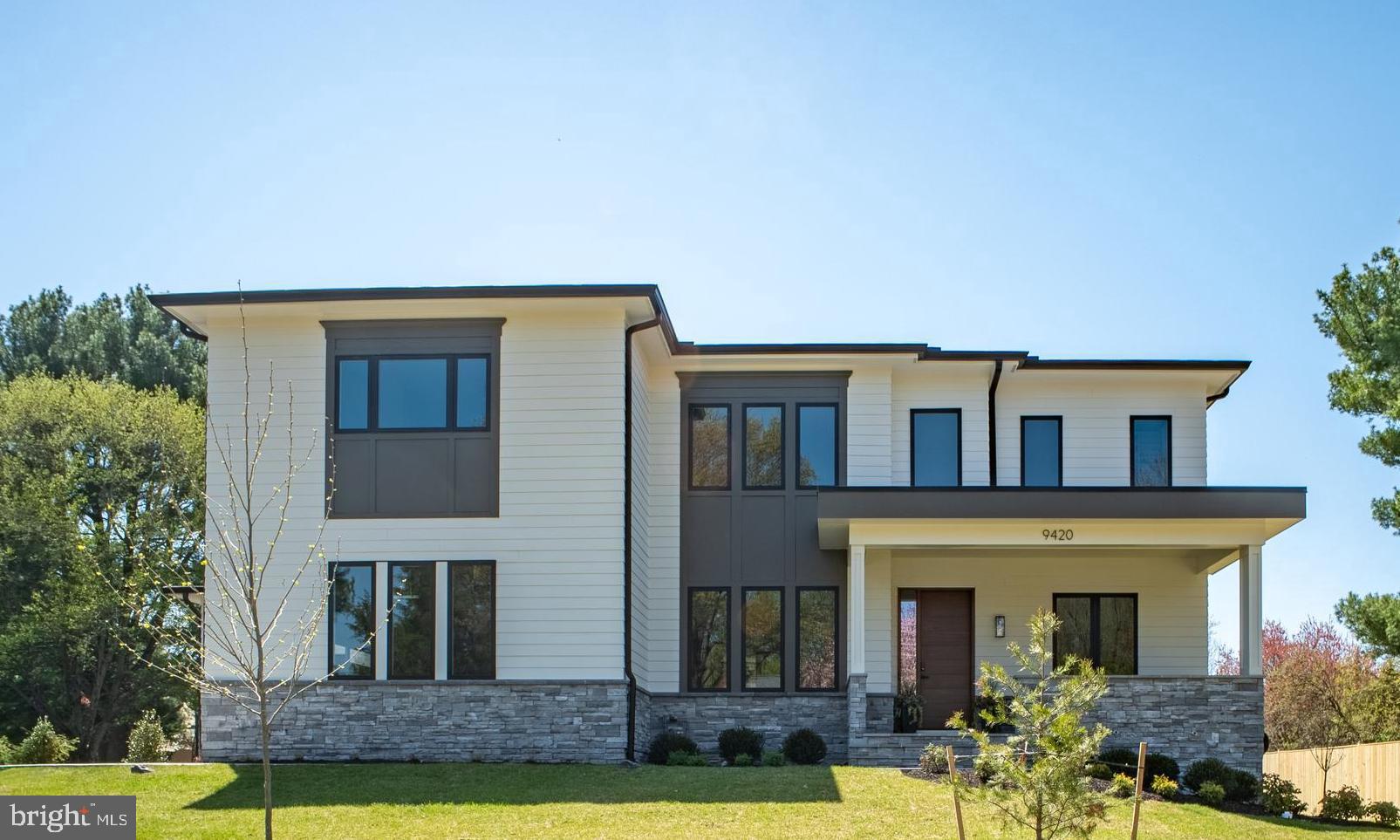 NEW PRICE! WELCOME!  NEWLY BUILT HOME ON A FLAT HALF ACRE LOT!  PUBLIC SEWER, WATER AND GAS!  OPEN LAYOUT CONCEPT! MAIN LEVEL GUEST SUITE!  ENSUITE BEDROOMS UPPER LEVEL!  3 CAR GARAGE!  OPEN HOUSE SUNDAY JULY 26th,  FROM 2.00 PM to 4.00 PM.  

Stunning new construction of uncompromising luxury and refined elegance by Bella Home Construction at 9420 Vernon Dr, Great Falls, Virginia, perfectly positioned on a flat half-acre lot along a quiet street.  This move-in-ready property offers a 3-car garage and endless potential to create your dream backyard—yes, there’s room for a pool. This new home is connected to all public utilities!
 Enjoy a prime location just minutes from downtown McLean, with easy access to Washington, DC, Dulles Airport, and major commuter routes, all within the prestigious Langley High School district.

Designed with modern finishes and thoughtful functionality throughout, this home offers a well-balanced layout ideal for both everyday living and entertaining.

The main level features a private bedroom suite with a walk-in closet and full bathroom, perfect for guests or multi-generational living. A dedicated home office with built-in cabinetry provides an ideal work-from-home setup. The open-concept layout flows seamlessly into a breakfast area with access to a large deck, creating the perfect indoor-outdoor connection.

The gourmet kitchen is designed to impress, featuring flagship appliances, a large walk-in pantry, quartz countertops with a full-height quartz backsplash, and custom cabinetry with integrated trim lighting, delivering both functionality and a refined modern aesthetic.

Upstairs, all bedrooms are designed as ensuite retreats, each offering its own private bathroom and walk-in closet, ensuring privacy and convenience for every family member. The luxurious owner’s suite offers a spa-inspired bathroom with heated floors, along with a modern electric fireplace that creates a stylish and inviting seating area.

The lower level is designed with lifestyle in mind, featuring a gas fireplace, wet bar for added convenience, an additional guest bedroom with full bathroom, a powder room, a dedicated gym room, abundant storage space, and a spacious open-concept TV and recreation area—perfect for entertaining and everyday living.

Throughout the home, you’ll find hardwood flooring across all three levels, complemented by Andersen casement windows, and carefully selected luxury fixtures, all contributing to the home’s high-end finish and timeless appeal. Abundant storage throughout. 
This home combines location, modern design, and practical living—making it a standout opportunity in one of Northern Virginia’s most desirable communities.  Showings by appointment only.