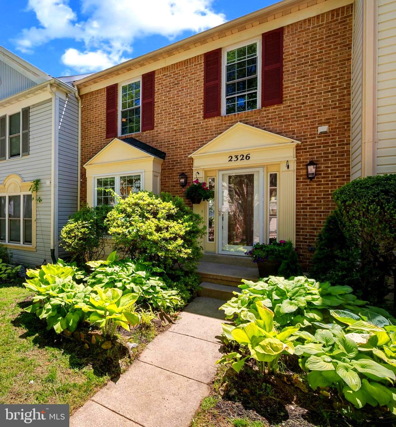 OPEN HOUSE SUNDAY,  JUNE 7, 1 - 4 PM!  Welcome home to this spacious, beautiful brick front townhome in Longmead Crossing; the heart of Montgomery County!  Perfect for entertaining family and friends, the main level features a bright open floor plan, a re-designed European style kitchen with modern cabinets, newer kitchen floor, and fully re-finished solid hardwood floors.  Sleek custom chrome and glass stair railing designed and built by a National Gallery of Art craftsman.  Enjoy maintenance marble tile in the main level powder room.    Exhale on your maintenance free deck; perfect for grilling, sunbathing, or just relaxing in the sunshine and fresh air.  

The upper level is accented by maintenance free hardwood floors, and a vaulted ceiling in the primary bedroom.  A skylight in the roomy primary bath elevates the theme of abundant natural light throughout the home.   Enjoy low maintenance marble tile in the hall bath.   Generously sized second and third bedrooms complete your very comfortable upper level.  

The lower level is a paragon of practicality.  Entering from the main level or from the outside at ground level affords maximum flexibility for a potential rental, in-law, or au pair suite.  The large family/rec room with a working gas fireplace will warm you on those chilly nights.  The bonus full size window in the rear adds even more light.  The bonus lower-level full bath features a tub for the little ones.  The bonus room in back could be converted to a second kitchen if desired; plumbing hook-ups are ready.  A second fridge conveys with the property.  Lush gardens in front and back with perennial plants, shrubbery, and trees.  SPECIAL NOTE I:  The roof is new; preplaced in April, 2026.  SPECIAL NOTE II:   All  polybutylene pipe was   replaced @ 2012. There is quick and easy access to the ICC (3 minutes away), The Glenmont metro stop is 9 min away.   The Metro Bus stop is walkable (at Homecrest Rd & Longmead Crossing Rd.).  Convenient shopping, and area parks (Northwest Park, G.C., Layhill Park) are less than a mile away.  Excellent schools are nearby!  Consult Montgomery Co. Schools directly for school assignments.