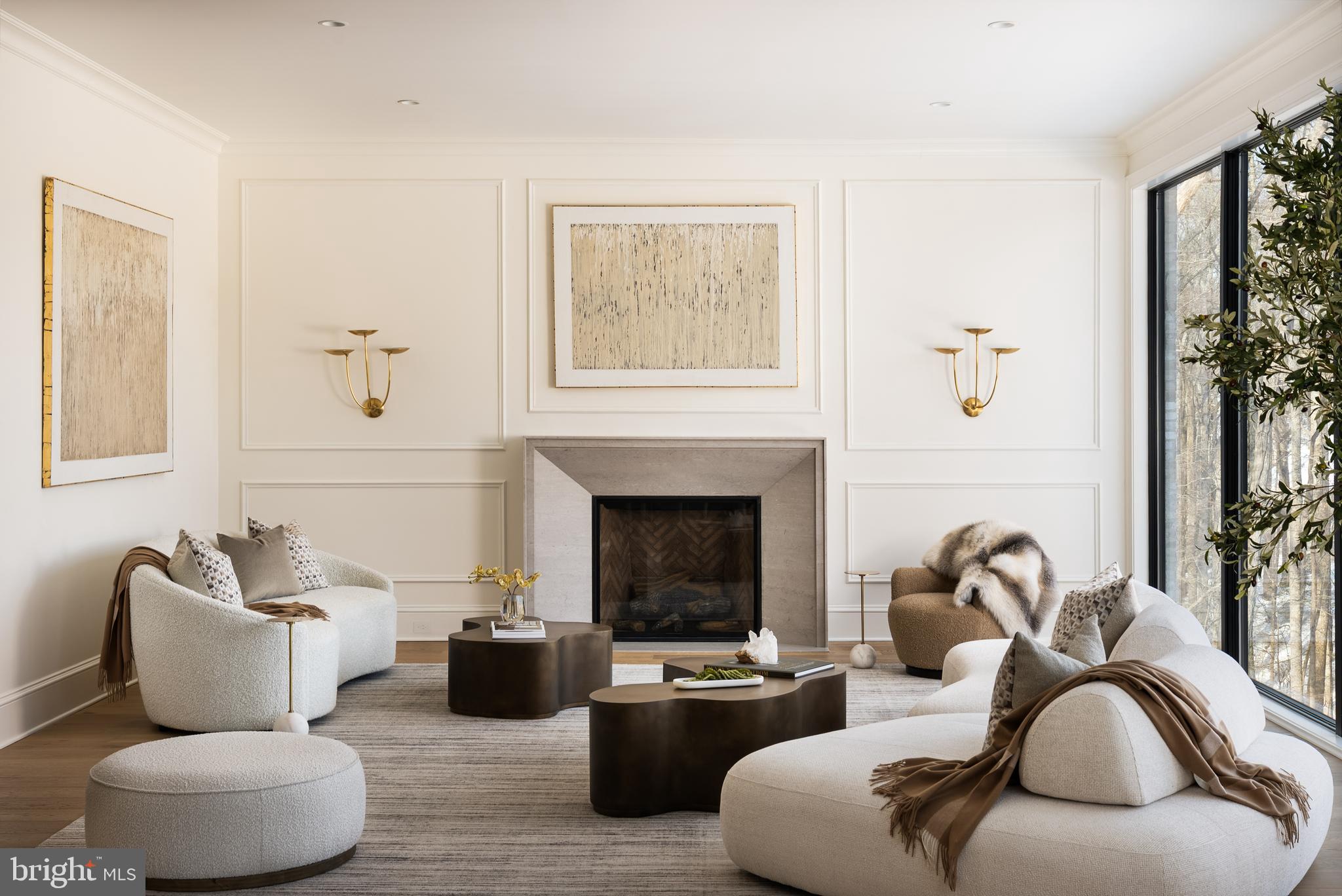 Crafted with uncompromising attention to detail, this extraordinary new construction estate by Lavenir Custom Homes with interiors thoughtfully curated by Boxwood Living - stands as a refined masterpiece of architectural elegance.

Set on 1.46 private acres and spanning 11,471 square feet, the residence is introduced by a striking façade of light-toned stone and brick, a custom-designed drive, and a lantern-lit front portico that establishes an immediate tone of timeless sophistication.

Inside, a dramatic 22-foot foyer and architecturally sculpted curved floating staircase create a breathtaking first impression. The main level flows through refined yet inviting spaces: an elegant sitting room bathed in natural light, a formal dining room elevated by bespoke millwork, and an expansive great room framed by floor-to-ceiling windows that embrace serene views of the manicured grounds.

At the heart of the home, the show kitchen by Lobkovich showcases a commanding 14-foot rift-cut white oak island, fully paneled appliances, a discreet secondary prep kitchen, and a generous walk-in pantry - equally suited for everyday living and grand-scale entertaining.

Upstairs, the luxurious primary suite offers a private balcony, a spa-inspired marble bath with dual vanities and soaking tub, and generous custom walk-in closets. Four additional bedroom suites provide exceptional privacy and comfort, each with ensuite baths and tailored closets.

The lower level elevates leisure and wellness with a temperature-controlled wine cellar, full gym with sauna and steam shower, intimate theater, fireside lounge, and fully appointed wet bar - ideal for unwinding or hosting with ease.

Outdoors, the experience rivals that of a boutique resort. A serene setback pool and spa anchor the property, complemented by a beautifully appointed pool house and covered patio with fireplace and shiplap ceiling, designed for effortless year-round enjoyment

A four-car garage and professionally curated landscaping by Wheat’s Landscape complete the estate. A rare fusion of exquisite craftsmanship, refined interiors, and resort-inspired amenities, this residence stands as a statement of enduring elegance and distinction.

Welcome to 8634 Overlook.