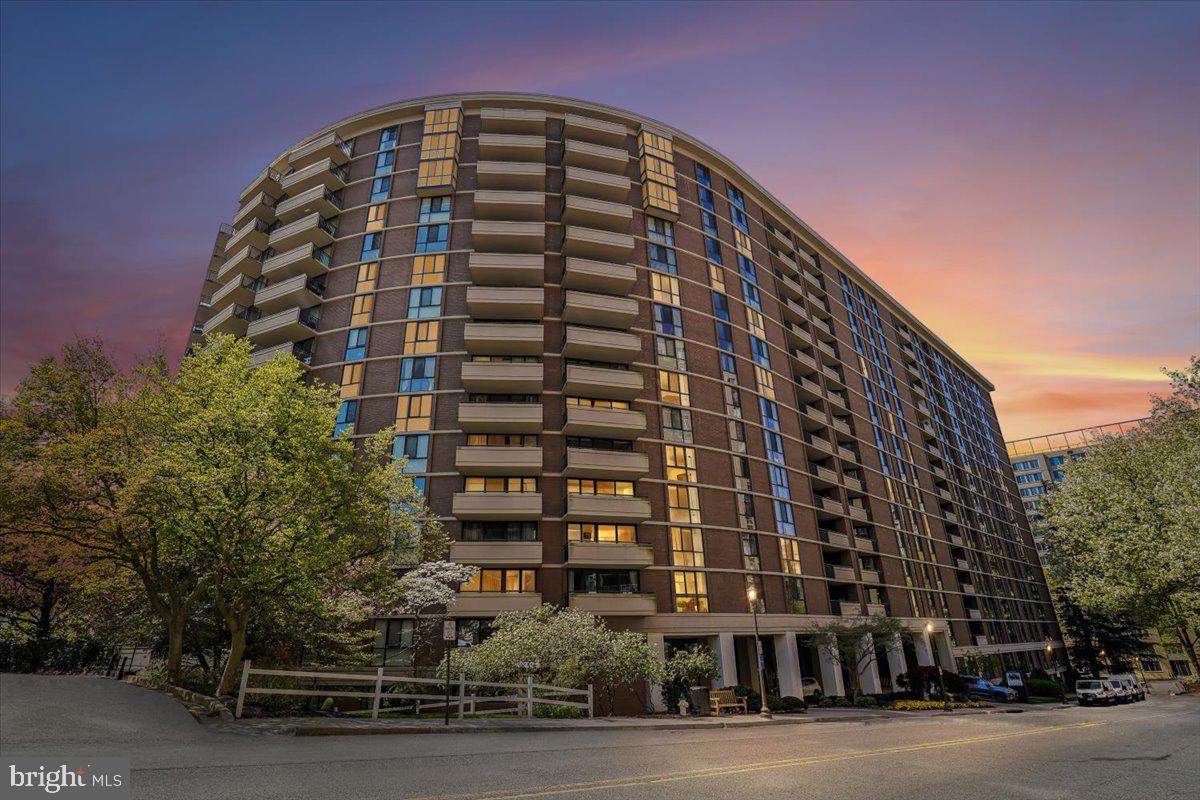 Step into this rarely available 1,609 sq. ft. three‑bedroom, two‑and‑a‑half‑bath residence perched on the 12th  floor, where captivating  views create a stunning backdrop from every room. Sunsets here are truly remarkable.

1205E, Located in the sought‑after 4620 N. Park Avenue condominium, this spacious home offers an exceptional blend of comfort and sophistication. The expansive living room is enhanced by custom built‑in bookshelves and cabinetry, adding architectural interest and generous storage. A large dining room, perfect for entertaining, flows seamlessly from the living area and opens to a private balcony ideal for relaxing or dining outdoors.

The updated eat‑in kitchen features custom cabinetry, granite countertops, and stainless steel appliances, creating an inviting space for everyday cooking. A separate laundry room, abundant closets, and many updates throughout make this home truly move‑in ready. Two tandem garage parking spaces convey.

Located in the beautifully renovated 4620 N Park condo building in the heart of Chevy Chase, residents enjoy top-tier amenities, including a 24-hour concierge, outdoor swimming pool, fitness center, sauna, library, party room, and on-site management. Condo fee includes ALL utilities. The location is unbeatable—just minutes from Friendship Heights Metro, Whole Foods,  Trader Joe's, top restaurants, and premier shopping, with the added convenience of a free shuttle service to the Metro and nearby shops.

Don’t miss this phenomenal opportunity!!