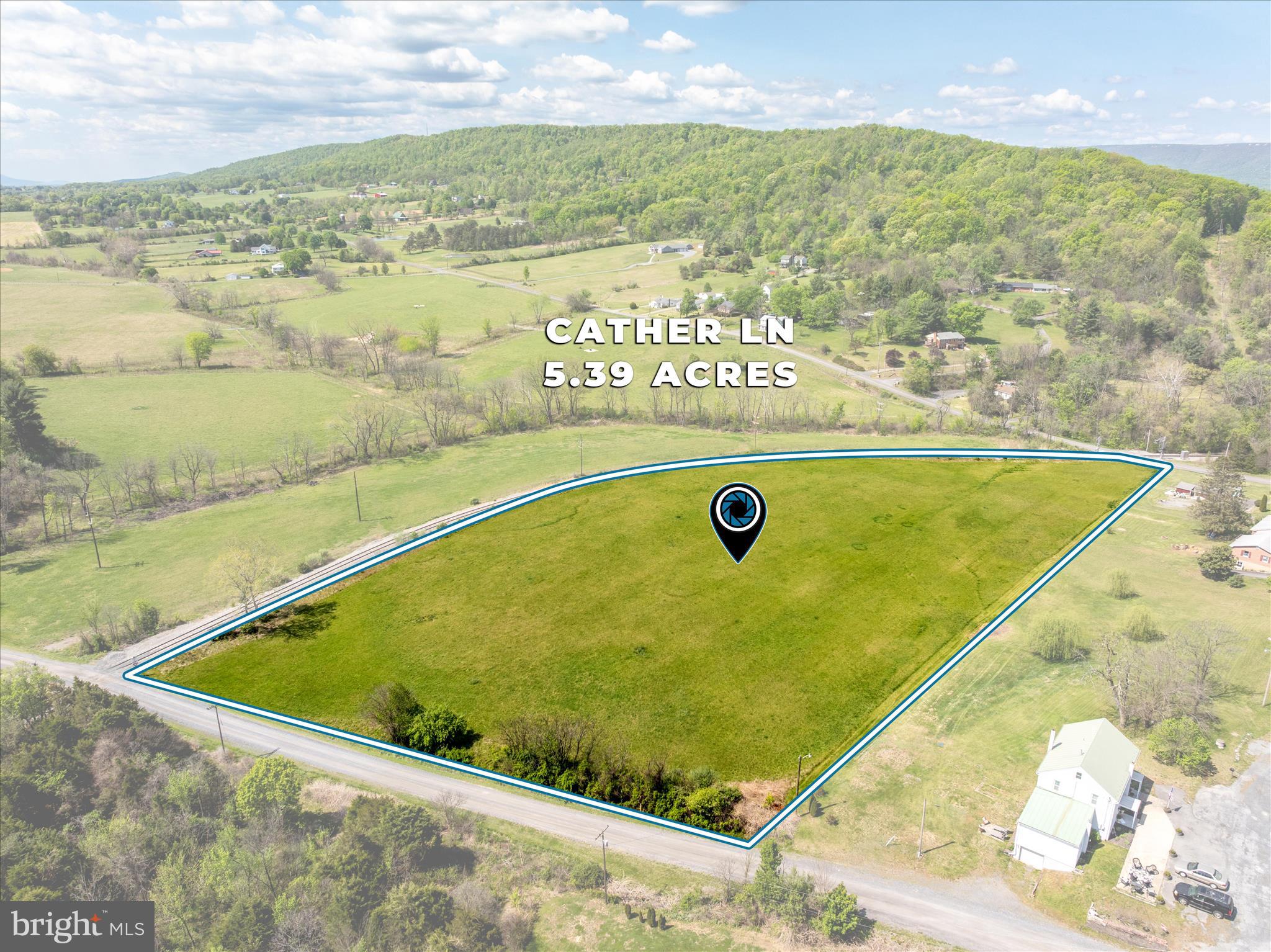 Searching for the ideal place to build your dream home? This awesome 5.39 acre parcel delivers stunning views and a convenient location just minutes from town. Situated right off Rt 50 with easy access to Rt 37 and Interstate 81, you’ll be close to gas stations, restaurants, shopping, the hospital, and so much more—offering the perfect blend of peaceful country living and everyday convenience. Seller is in the process of completing a perc test!