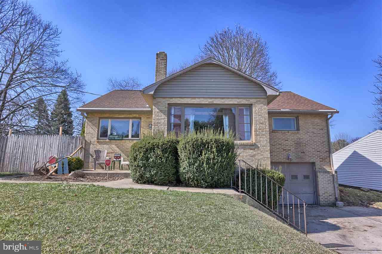 Mechanicsburg school district within walking distance to elementary and high schools.  Giant yard with a gazebo to relax in the shade after work and watch the kids or dogs play.  Take a stroll down to the park or just relax in the a/c in this beautiful mid-century gem.  Wood floors, a newer Furnace, and an updated kitchen make this house a great home. The finished lower level offer flexible living space.