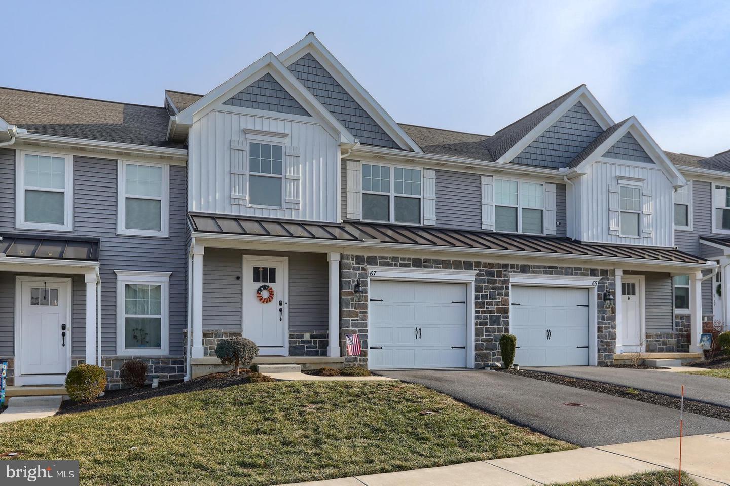 Move-In Ready! Stunning Upgraded Townhome in Mayapple Woods.  Conveniently located 15 minutes from Hershey and 15 minutes from the PA Turnpike.  

Immediate occupancy is available, and this seller is motivated to sell!! Beautifully upgraded Holden model! Step into the impressive two-story foyer, where a tasteful color palette throughout enhances any décor.  The open staircase has been upgraded to include wrought iron posts.  And the wooden railings match the hardwood floors flowing through the home.

The main living area features charming shiplap walls and a striking stone gas fireplace, creating a warm and inviting atmosphere. New plantation shutters were added (and stay) to the rear sliding glass doors and window adding privacy and style!  The well-appointed kitchen boasts a farmhouse sink, walk-in pantry with decorative glass door, stainless steel appliances (stay), granite countertops, tile backsplash, and a spacious island—perfect for cooking and gathering. Stylish upgraded lighting fixtures and newly installed hardwood floors complete the dining area.

Upstairs, you’ll find three spacious bedrooms, including a luxurious primary suite with a walk-in tile shower, new ceiling fan, upgraded fixtures, and a walk-in closet. The main bath and dedicated laundry room (washer and dryer stay) add convenience to the upper level.

The finished walkout basement is an entertainer’s dream, featuring a full-service bar with built-in shelving, running water, and a recently added half bath.  Included in the sale are 2 mini refrigerators.

Located in a quiet suburban setting, this home is within walking distance of the historic charm and amenities of Annville. The Mayapple Woods development offers scenic walking trails, both paved and natural, for outdoor enjoyment.

Situated on a premium lot, this home offers panoramic views from all three levels, whether from inside or while relaxing on the main-level deck.

Don’t miss this rare opportunity! Schedule a showing today and experience the perfect blend of single-family home amenities with the low-maintenance convenience of an award-winning townhome community.