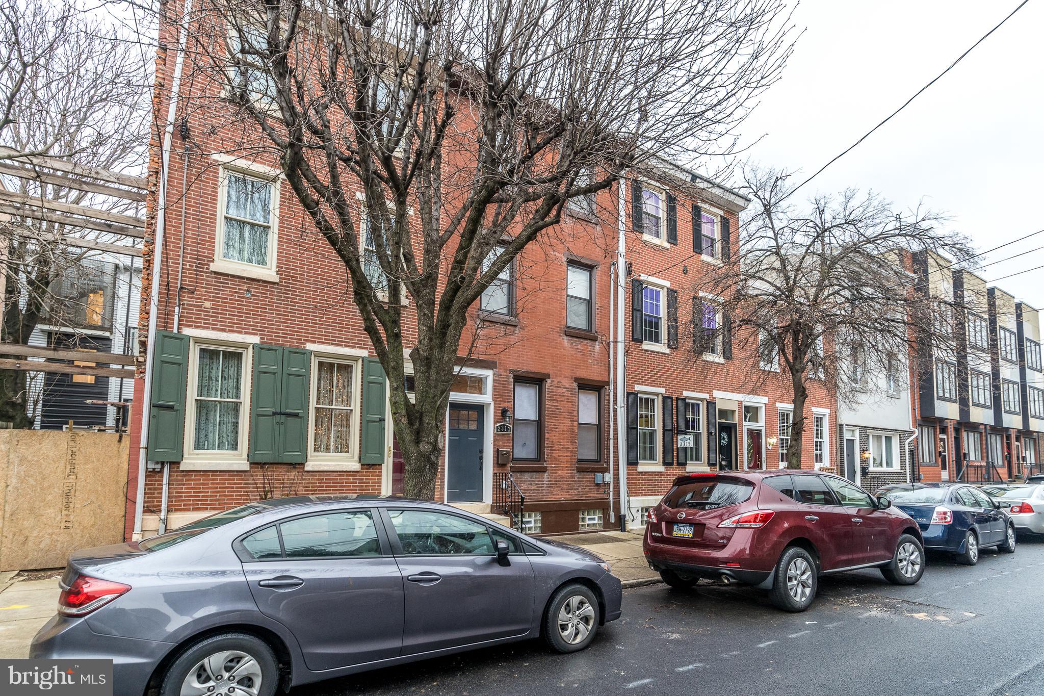 Welcome to Fishtown!  Totally renovated from top to bottom.   This 3 bed, 2 .5 bath home has all new Bruce hardwood flooring t/o,  recessed LED lighting, huge chef's kitchen w/ 42 inch cabinets, stainless appliances, center island, + quartz counters.  2nd floor has 2 bedrooms bedrooms w/ loads of closet space + a full sized laundry room w/ new washer/dryer.  3rd floor is an expanded master bedroom w/ vaulted ceilings, huge walk-in closet, full bathroom w/ 60inch double vanity + walk-in shower. Finished basement w/ high ceilings provide additional living area.   Zero maintenance patio area for entertaining. Exposed brick, central air, new windows, electrical, plumbing, sheetrock, paint + fixtures.   Located in the real heart of Fishtown, close to I-95, Septa, numerous cafes, bars restaurants!