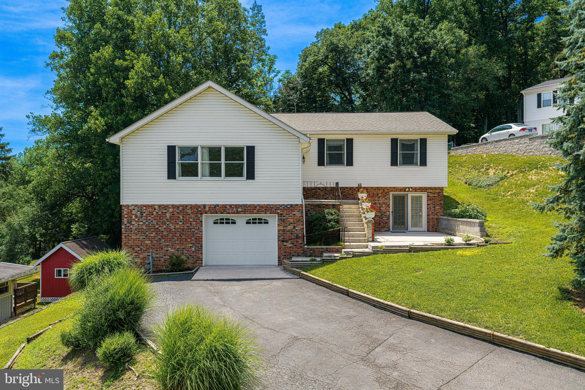 FANTASTIC LOCATION and very close to I68, Restaurants, Shopping, Downtown Cumberland, Allegany College of MD and UPMC Western Maryland Hospital!  THIS ONE OWNER RAISE- SPLIT LEVEL WAS CUSTOM BUILT & LOVING CRAFTED BY FATHER AND SONS.   YOU WILL BE CHARMED BY THIS 3-BEDROOM, 3-FULL BATH HOME, WITH A LOVELY MORNING DECK OFF THE BREAKFAST AREA.   THE WALK-OUT, FULLY FINISHED LOWER LEVEL REC ROOM  WITH WET BAR ALSO BOASTS A SEPARATE LAUNDRY, MUDROOM & FULL BATH!    FEATURES INCLUDE: CENTRAL AIR CONDITIONING-4 yrs old, NATURAL GAS HEAT- 4yrs old & HOT WATER- 9 yrs old, OVERSIZED LIVING ROOM, SPACIOUS KITCHEN, SEPARATE DINING ROOM & A PRIMARY BEDROOM WITH ATTACHED FULL BATH AND WALK-IN CLOSET.  THE ROOF IS JUST 7 YRS OLD! THE SHE-SHED/MAN-CAVE IS ACCESSED FROM THE DECK - NICE AND PRIVATE!  > > > > >    MAKE AN APPT TO TOUR TODAY!