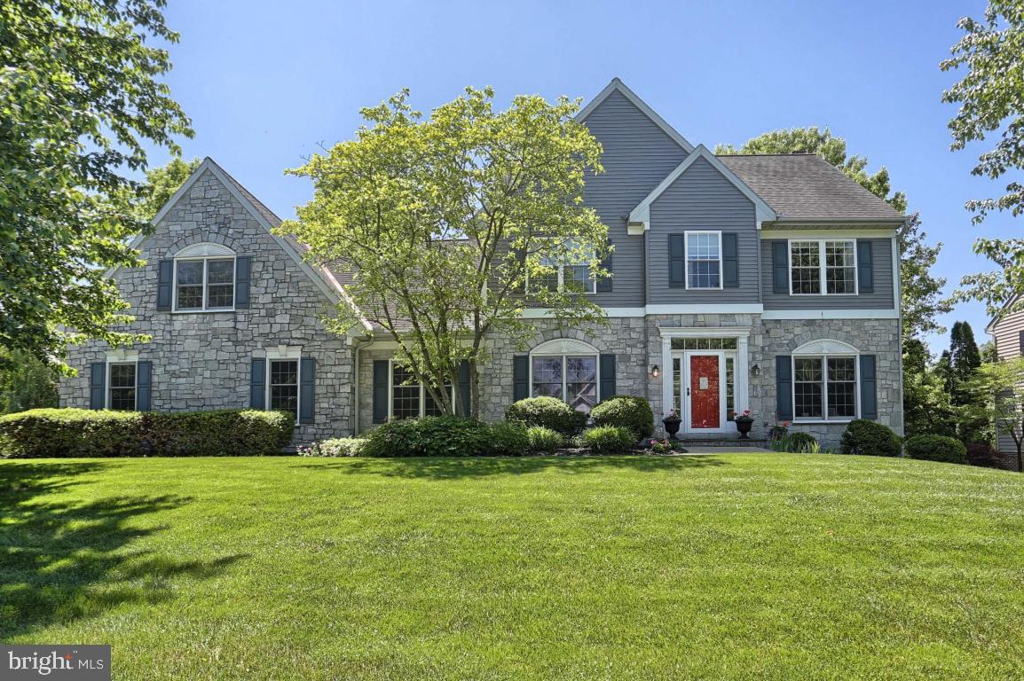 Open floor plan, spacious home in Manheim Township's Oak Lane on .42 acre lot with new paint and carpet. Quartz eat in kitchen with island, breakfast bar, tile backsplash and pantry closet. Hardwood flooring, first floor office and laundry room and tray ceiling in dining room. Master suite with vaulted ceiling, sitting area, tile shower and whirlpool tub.  Finished lower level with built ins and half bath. Great outdoor space with rear deck and patio leading to fenced in backyard. Convenient location.