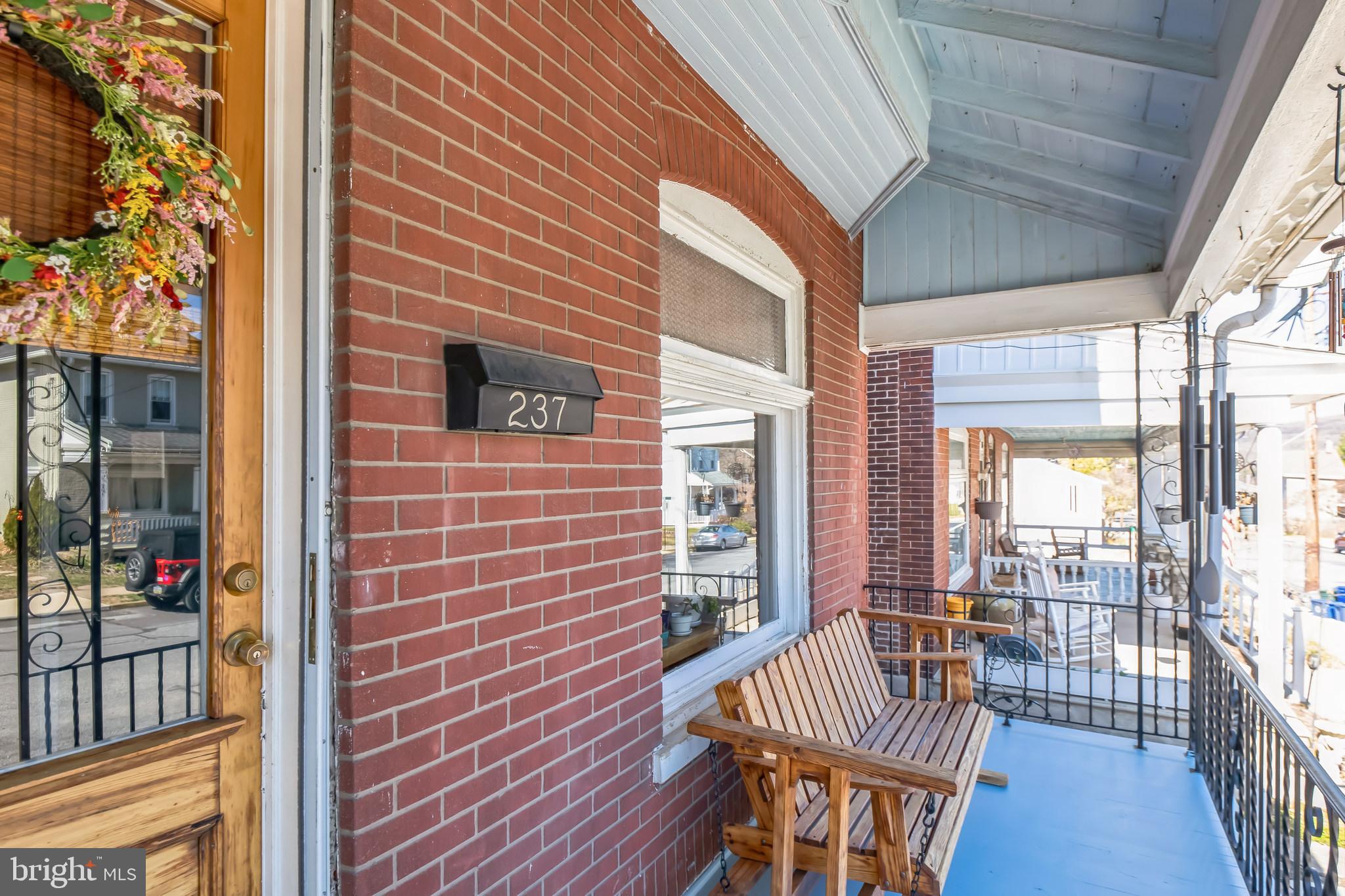 This delightful brick twin is full of character and waiting for it's new owners! As you step through the front door,  you are greeted by a spacious and inviting living room perfect for relaxing and entertaining. The heart of the home is the cutest kitchen and nook that then takes you to your back deck and yard  that's perfect for outdoor gatherings or morning coffee. Upstairs you'll find three generously sized bedrooms featuring hard wood floors. The bathroom provides more classic charm.  If you need even more space the attic offers the potential for an office, storage, or playroom. The basement offers a woodshop, perfect for the hobbyist or DIY'ers. You'll stay cool in the summers thanks to the current owners, who had a  a brand new HVAC system installed in 2021. The home has been freshly painted leaving you with a move-in-ready home. With it's blend of charm, versatility and functionality the home is a must see!