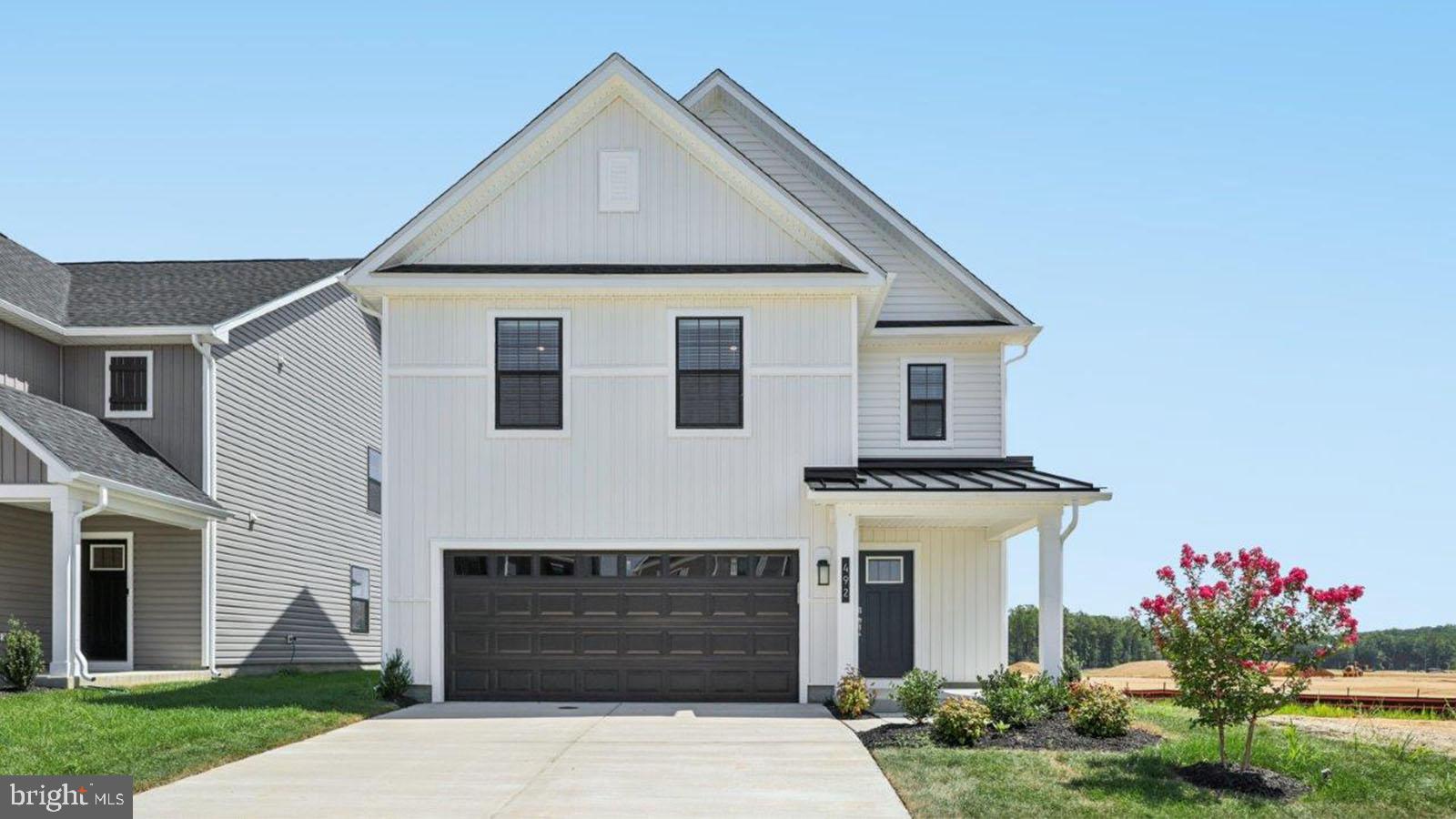 Introducing The Cabral: a stunning 1,665 square foot open-concept, two-story home perfect for modern living. Key MLS features include three spacious bedrooms, two and a half bathrooms, an open loft, and a two-car garage. From the charming front porch, step into a welcoming foyer with a convenient powder room and coat closet. The expansive living room seamlessly connects to the eat-in kitchen, featuring stainless-steel appliances, sleek cabinetry, a large island with seating, and a walk-in corner pantry. Enjoy abundant natural light and easy backyard access through the sliding glass door. 

Upstairs, the luxurious owner’s suite is a must-see, boasting a generous bedroom, ample walk-in closet, and an impressive owner’s bath with a luxurious shower. Additional family space includes two large bedrooms, and a hall bathroom, The centrally located laundry room and hall linen closet add convenience.