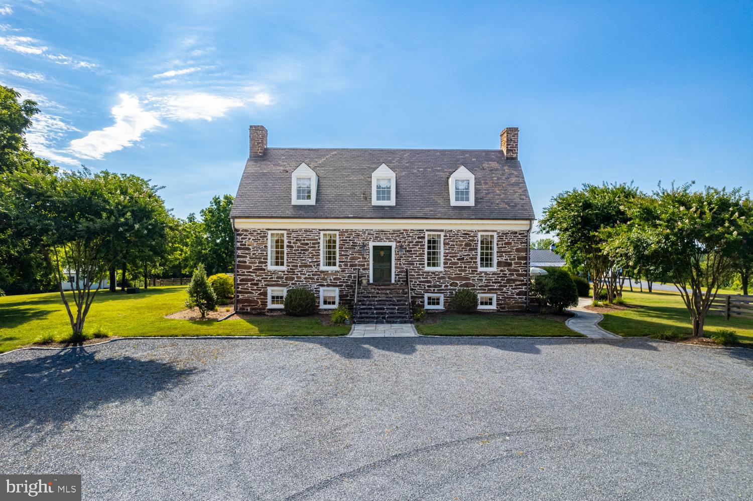 LOOKING for the opportunity to own a piece of Virginia history? "THE ROCK HOUSE" circa 1790 awaits! This historical gem is comprised of 32.52 acres, a newly built equestrian facility & meticulously restored/renovated! This bucolic home boasts modern amenities with all of the charm of yesteryear! Constructed of native stone/hand laid walls/window sills that are 3 ft thick, 7 fireplaces  5 original w/hand carved mantels, original hand carved woodwork/railing/floors throughout, a grand entrance w/wainscoting from floor to ceiling, formal living & dining room, 9ft+ ceilings, custom kitchen w/custom cabinets, granite countertops, island and desk area, the second floor has 3 large bedrooms All offer en-suite bathrooms each w/slate flooring, fireplaces, & walk-in closets! The walkout basement boasts radiant heated floors, a fireplace, & an inlaws suite. 
The land offers many heirloom plants/trees  black walnuts, a 100+yr old magnolia, & a property border of established pine/hardwoods. 
Equestrian amenities   NEW! Morton 4 rubber matted Eurostalls w/dutch doors concrete center aisle barn, autowaterers, walk up hay loft, tack room, feed room, hot/cold wash stall, regulation dressage arena w/waterless footing, 9 large grass paddocks w/4 board fencing, 60ft fenced roundpen w/footing, large outdoor shed, & trails/rideout on property! Additional 47.36 acreage available (sep MLS listing).
 LOCATION 21 miles to Lynchburg/Liberty University, airports, dining, shopping, & Lexington Horse Center approx. 1hr! Historical information available to qualified buyers.