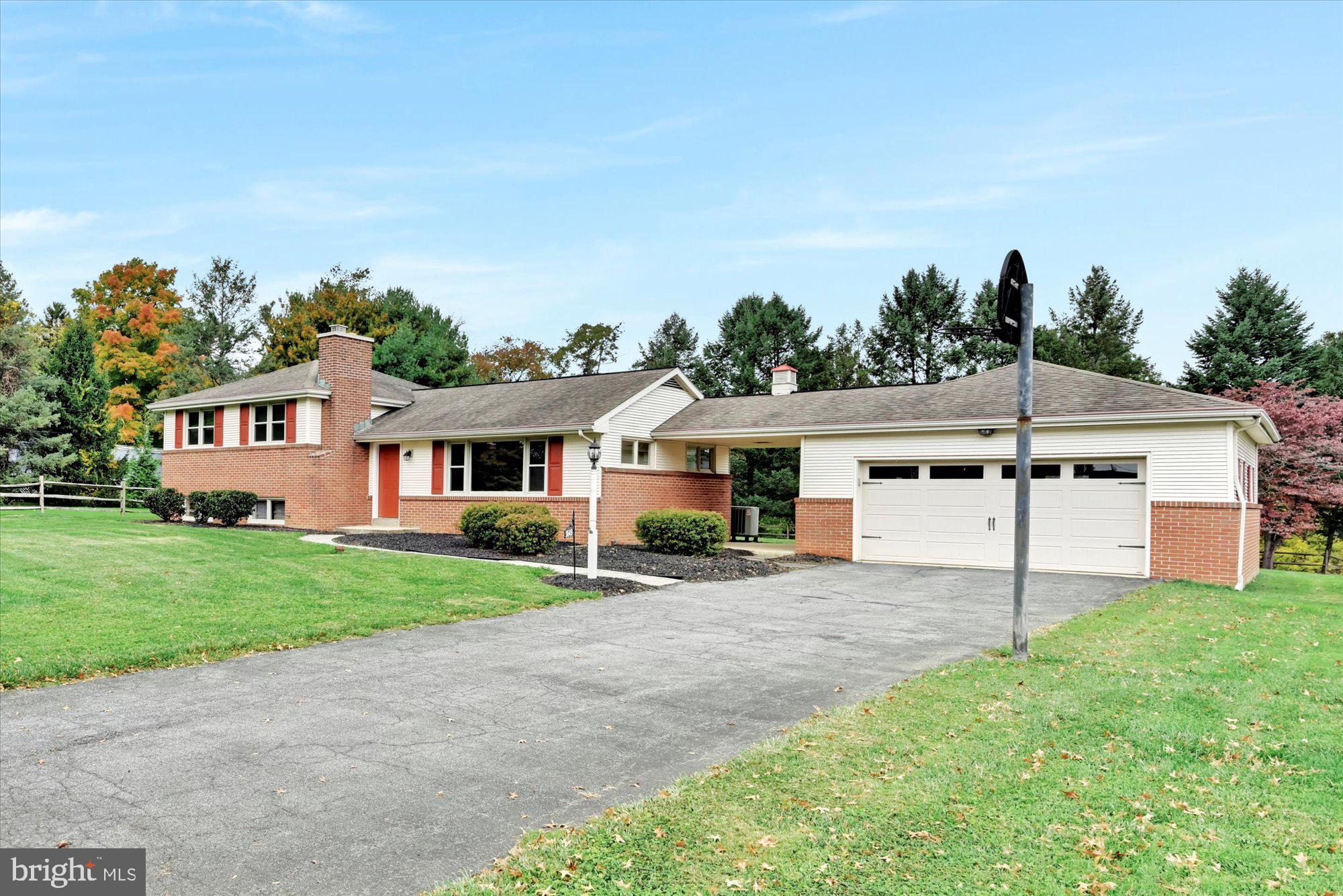Location, location, location. Sited on a large level lot with privacy you will find this well-maintained classic brick and vinyl 4 level split. A country setting with great views in Hempfield School District. Oversized 2 car garage with storage above. Great for outside entertaining with patio, walkways and breezeway. Home is move in ready with new flooring and fresh paint.