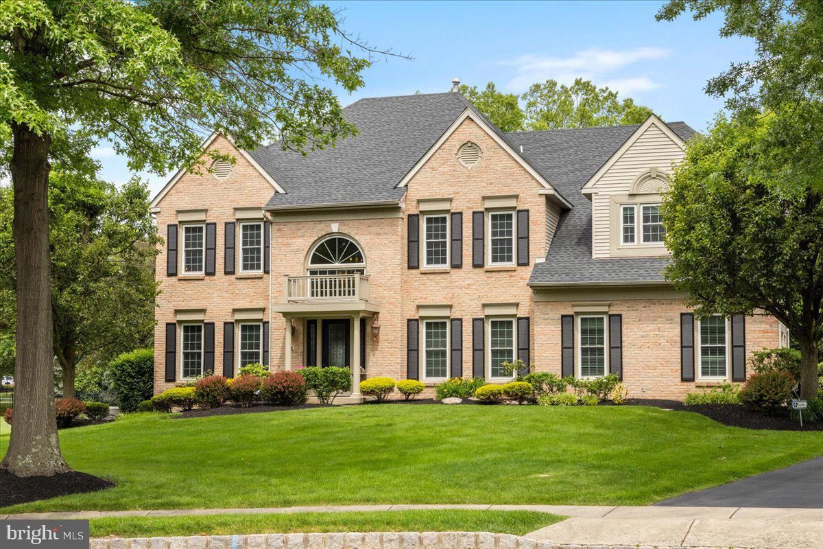 Embrace the extraordinary with 5 Windrose Circle - a move-in ready opportunity in mint condition. Tucked away on a quiet cul-de-sac on one of the largest lots in the highly sought-after Doylestown Lea neighborhood, this exquisite 4 bedroom, 3.1 bath home offers sophistication and elegance at every turn, while featuring timeless beauty and superior craftsmanship. From the covered front portico, step into the magnificent foyer with soaring ceilings, where you are greeted by beaming natural light. To the left is an inviting, oversized office with French doors, offering the perfect work from home setting. To the right, you will find an elegant dining room with custom crown molding, chair rail, and wall decor, creating an elevated space for formal entertaining. Through the dining room, you'll find a full butler's pantry and wet bar, complete with a refrigerator and built-in ice maker, for making your favorite cocktail on the rocks. The gourmet kitchen is a culinary masterpiece built by Bucks County's highly acclaimed J.R. Maxwell Builders. It features top-of-the-line Viking appliances, Miele oven with convection microwave and warming drawer, spacious pantry with a modern sliding barn door, abundant custom cabinetry by Cashman Woodworking, and quartz countertops throughout. The center island serves as the ideal meal prep station for you and your sous chef. Enjoy the expansive peninsula with custom-built wood countertops by Grothouse for intimate dining on weeknights. The open floor plan of the home allows for unobstructed views from the kitchen into the stunning two-story great room that features a spectacular gas fireplace with tile surround and stylish upgraded carpet. Adjacent to the great room is a second, private office or playroom with a sunny bay window and a convenient powder room. Completing the first level is a spacious mudroom with ample storage space, built-in laundry bins, and a cleverly installed laundry chute from the primary suite. Ascend the grand staircase, or take the switchback stairs by the kitchen, up to the second level where you'll find the lavish primary suite, with a cozy separate lounging area, cathedral ceiling, and electronic shades that bring in the morning light at the touch of your fingertips. Relax in the spa-like en suite bathroom, with slate tile flooring, large soaking tub, oversized stall with rain shower, and dual vanities. Two spacious walk-in closets with custom organization and sizable linen closet round out the primary suite. The long hallway balcony overlooks both the front and back of the home. On one end, a generously sized second bedroom features its own en suite bathroom and walk-in closet. Two large bedrooms with closets share a hallway bathroom. Make your way to the home's lower level, where you will find a flexible space for game night or movie night. Golf enthusiasts will be thrilled to find their very own retreat with upgraded ceiling height, complete with a tailor-made putting green, multiple holes, realistic slopes, and areas for chipping. This blank canvas can be used for any type of recreation, fitness, or whatever use suits your needs. The enchanting backyard oasis with sprawling paver patio invites you to unwind and relax in style. All summer long, dine al fresco on a feast prepared using the built-in gas grill while listening to your favorite playlist from the exterior sound system discreetly positioned throughout the outdoor spaces. Enjoy the tranquility of the meticulous grounds, with mature trees and thoughtful landscaping that is kept flourishing by the exterior sprinkler system. Sophistication meets technology in this SMART home which features a remote climate-controlled HVAC, garage doors, doorbell, Sonos sound system and Generac generator for uninterrupted comfort. The neighborhood is perched within walking distance to Central Park with Kids Castle wooden playground, and just a bike ride away from Kutz Elementary School, restaurants, and boutiques of Doylestown.