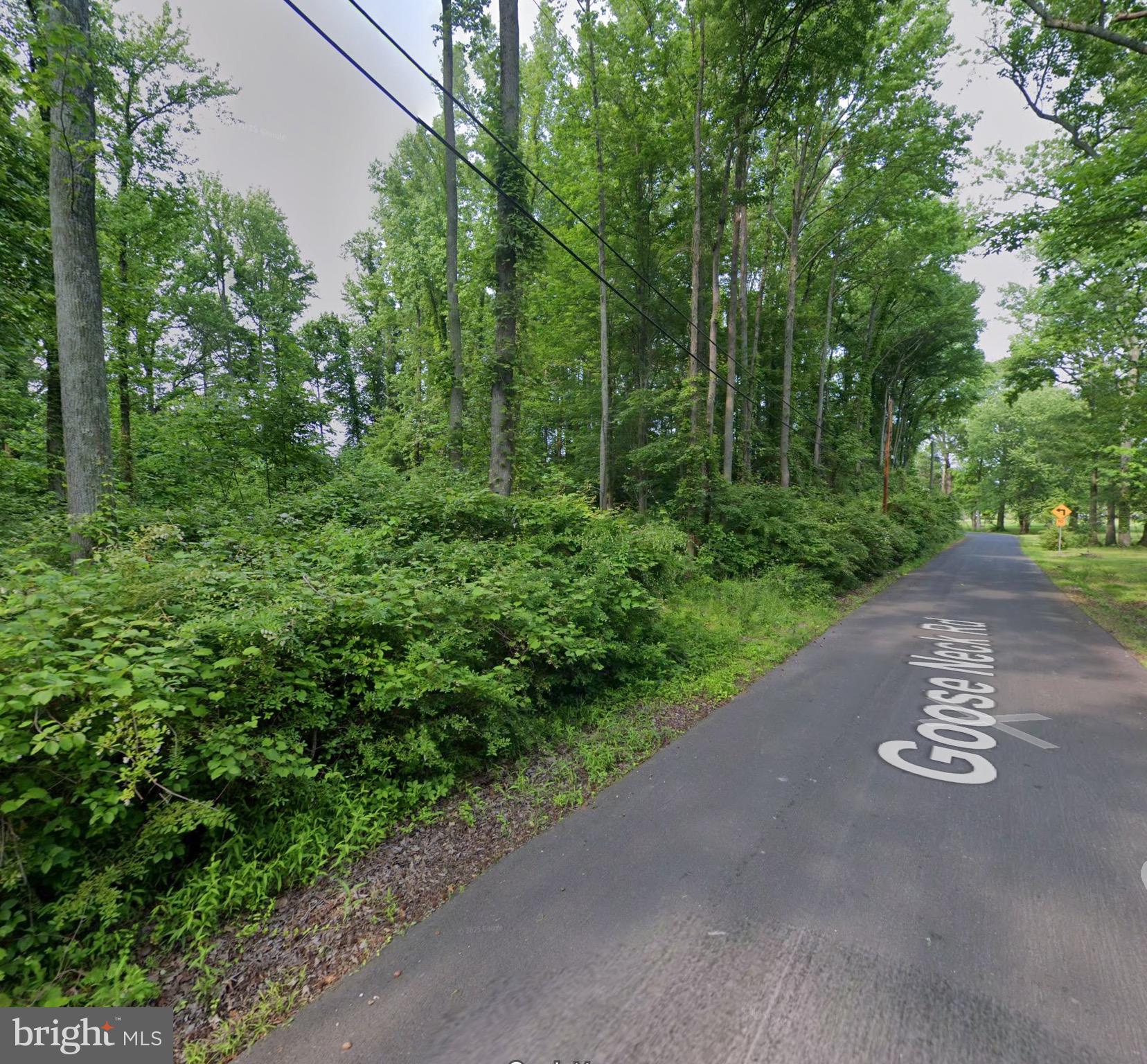 Once in a lifetime opportunity to build your dream house at Seneca Creek on the Bowley's Quarters Peninsula.  One of the largest lots in the area, have access to public water and sewer, quiet road , wooded lot, and views of the creek.  If you are fond of water and like the convenience of public water and sewer, this one is for you.  Bring your builder or we can recommend one.  Only one lot like it, and when it's gone, it's gone!