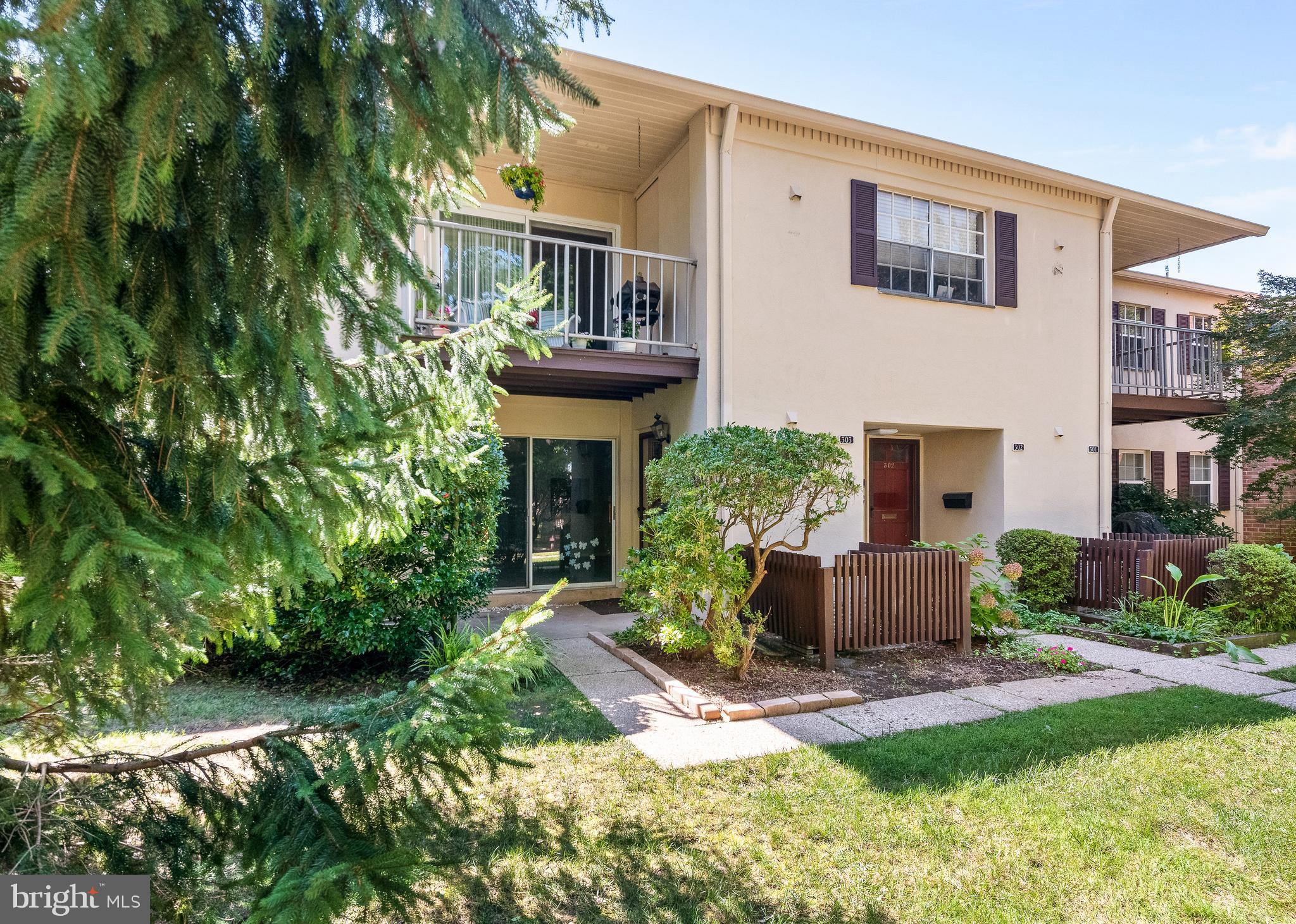 Perfect Location in Complex- Small entrance, small parking lot, Views of the interior courtyard and foot bridge this lovey 2-bedroom, two bath unit is clean and ready to go. With updates done about 10 years ago, maybe its time for a refreshing to make it yours! First floor unit with sliders to lovely patio.
