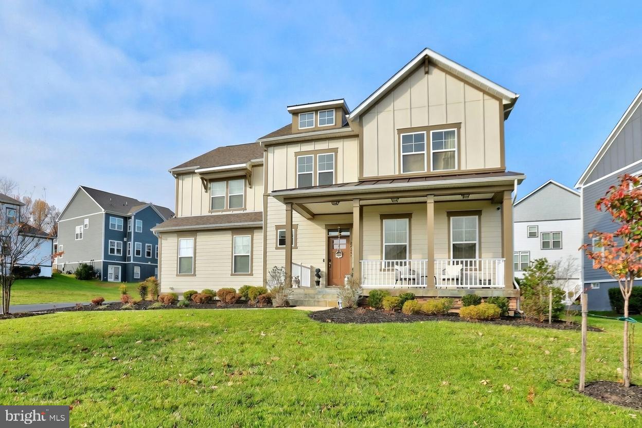 The crown jewel of Willowsford's Grove North, where luxury meets legacy on the community's largest 0.36 acre east facing lot! This 2021 custom built masterpiece by Beazer Homes spans 5,610 sqft of pure elegance, boasting 6 bedrooms, 5.5 baths, and an array of bespoke upgrades that elevate it far beyond the ordinary. Imagine waking up to sun drenched mornings, pulling into the longest driveway in the neighborhood, and stepping onto a flagstone porch that whispers "welcome home." Priced to command attention, this is the premier listing that's ready to redefine your lifestyle!

From the moment you arrive, the high visibility lot and side entry garage set the stage for grandeur. Venture out back to your private oasis: a sprawling 1,210 sqft flagstone patio with a built-in outdoor kitchen featuring two gas burners, a grill, natural gas connection, sitting wall, lush landscaping, ambient lighting, and a permanent gazebo, perfect for epic summer barbecues or starlit evenings. An in ground irrigation system keeps everything verdant, while the extended driveway offers ample parking for guests.

Inside, soaring 10ft main level ceilings and 9ft upper and basement ceilings create an airy, expansive feel. The two story foyer dazzles with a custom chandelier, leading to a formal dining/living room adorned with accent wallpaper. Cozy up by the Cosmos gas fireplace with remote control in the family room, extended by 4 ft for ultimate comfort. The gourmet kitchen is a chef's dream: all stainless steel KitchenAid appliances, a gas cooktop, pull out drawers, butler's pantry with custom built ins (added just 6 months ago), and a generous 56 inch walkway between the stove and island for seamless entertaining.

Upstairs, the primary suite is your personal retreat complete with a sitting area, walk-in closet with custom built-ins, and a spa like bath featuring a double sided shower and freestanding tub. Bedrooms 2-4 impress with walk-in closets; Bedroom 2 has its own private bath, while 3 & 4 share one. The main level bedroom with full bath (walk-in shower) is ideal for guests or multigenerational living. Downstairs, the fully finished basement with 4ft extension includes an extra bedroom, full bath, walk up access, pre-wired home theater (5.1 surround), rough in for a wet bar, and even a sauna for unwinding after a long day!

No detail overlooked: whole house tankless water heater, water softener, 1-zone HVAC, 30/15 Amp dedicated garage circuits, custom shelving in pantry and closets, designer wallpaper (extra rolls included), custom chandeliers throughout, and recent upgrades like new lighting fixtures and décor. Optional inclusions? Luxe custom drapes from India ($10K value) and furniture available upon request.

Nestled in award winning Willowsford – Loudoun's premier farm to table community, enjoy over 40 miles of trails, resort style pools with cabanas, kayak rentals on Willow Lake, fitness centers, clubhouses, playgrounds, disc golf, dog parks, an amphitheater, and fresh produce from the 300 acre conservancy farm. It's not just a home; it's a lifestyle of nature infused luxury!

Families will love the top rated Loudoun County Public Schools: Hovatter Elementary (PK-5), Willard Intermediate (6-8), and Lightridge High (9-12) all within a short drive. Commute to DC? Just 45-60 minutes via Rt. 50 or Dulles Greenway, with Dulles Airport 20 minutes away for easy travel. Local gems abound: sip wines at Quattro Goomba's Winery, explore historic Aldie Mill, hike Hal & Bernie Hanson Park, or dine at favorites like Ciro Ristorante or Brew Birds. Proximity to Ashburn's shopping, Leesburg's outlets, and Virginia's wine country makes this location unbeatable.

This isn't just a house, it's your forever sanctuary, customized for joy and built for memories. Opportunities like this vanish fast in Willowsford. Schedule your private tour today and step into extraordinary!