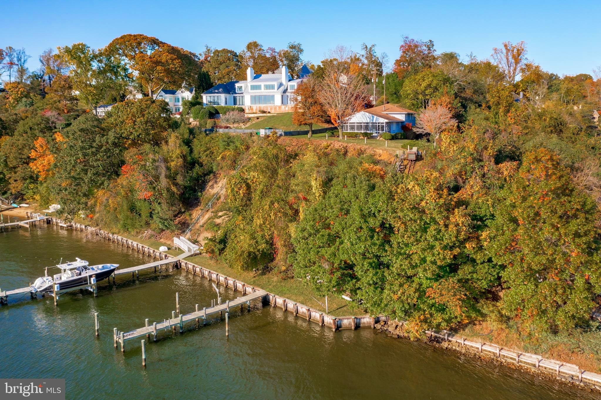 Premier Annapolis waterfront location with the most sought after Severn River Views! Enjoy magical sunsets from this elevated property with panoramic vistas. Elegantly sited on a 22,000 sf lot with private pier, multiple slips and bulkhead along 90+ feet of shoreline. Tucked away on your own street with public water, well-maintained character and newer septic system (2016) make this an ideal property to enjoy “as-is” or re-imagine! A proposed redevelopment plan was created in 2017 and shows the possibilities for development and expansion. This home is just about 5 minutes to Downtown Annapolis over the Naval Academy Bridge and close to Route 50. Winchester-on-the Severn is home to some of the most spectacular Annapolis Waterfront Homes and incredible amenities including access to the Chase Creek Swim Club, 4 piers, a marina, a huge beach and pavilion, playground and even a dog beach. It’s also located in the Broadneck, award-winning school district and adjacent to the B&A trail. This is an incredible opportunity and rare find along some of the most premier water frontage in Annapolis!