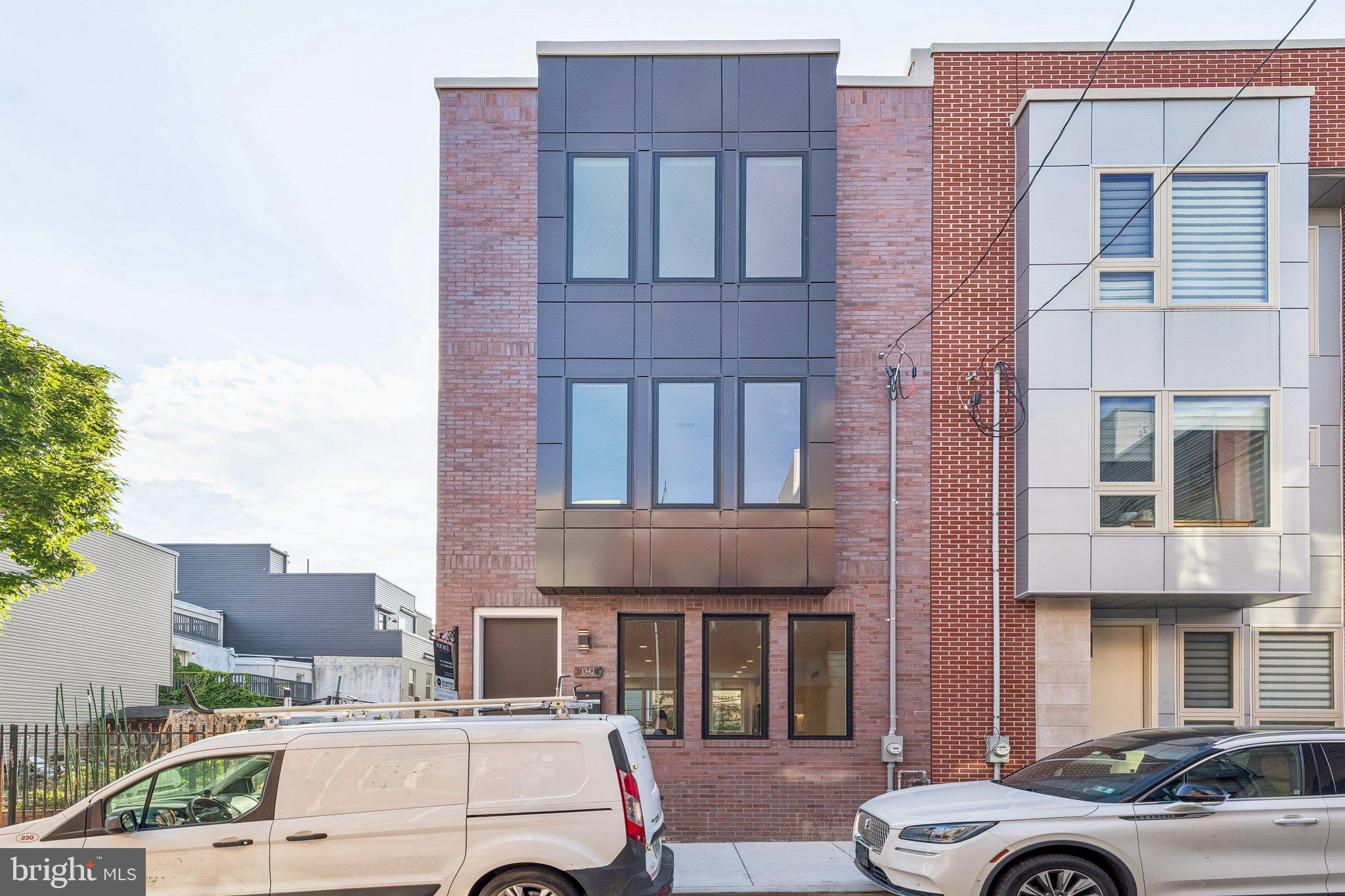 Welcome to 1342 S Bouvier Street — where modern new construction meets the soul of Newbold.

Set on one of South Philadelphia’s most exciting and evolving blocks, this 18-foot-wide residence delivers something incredibly rare for the city: scale, light, and flexibility. Wider than the typical Philly home, the extra width completely changes the way this property lives — creating open, airy spaces that feel elevated, functional, and built for real life.

Positioned directly beside the beloved Bouvier Gardens community space, the home offers a unique neighborhood connection that’s hard to replicate. Morning coffee next to the gardens, tree-lined views, and a true sense of community — all while being moments from the best of Newbold’s restaurants, cafés, parks, and transit access.

Inside, clean modern design meets warm organic finishes. White oak flooring runs throughout, balancing contemporary lines with a timeless feel. The kitchen was designed to make a statement, anchored by upgraded Café appliances, sleek quartz countertops, and a dramatic waterfall island that naturally becomes the center of the home.

The layout offers incredible flexibility for modern living — whether that means custom built-ins, designer lighting, a roof deck vision, home office, gym, or entertainment setup. Every space was designed to feel open, functional, and adaptable to a variety of lifestyles.

Surrounded by significant development, strong long-term growth, and a block filled with new energy while still carrying deep Philadelphia history, 1342 S Bouvier represents the perfect blend of investment, lifestyle, and modern city living.

With a 10 year tax abatement, buyers have the opportunity to enjoy substantial long-term savings while owning a piece of one of South Philadelphia’s fastest-growing neighborhoods.

This isn’t just another new construction home. This is Newbold’s next chapter.