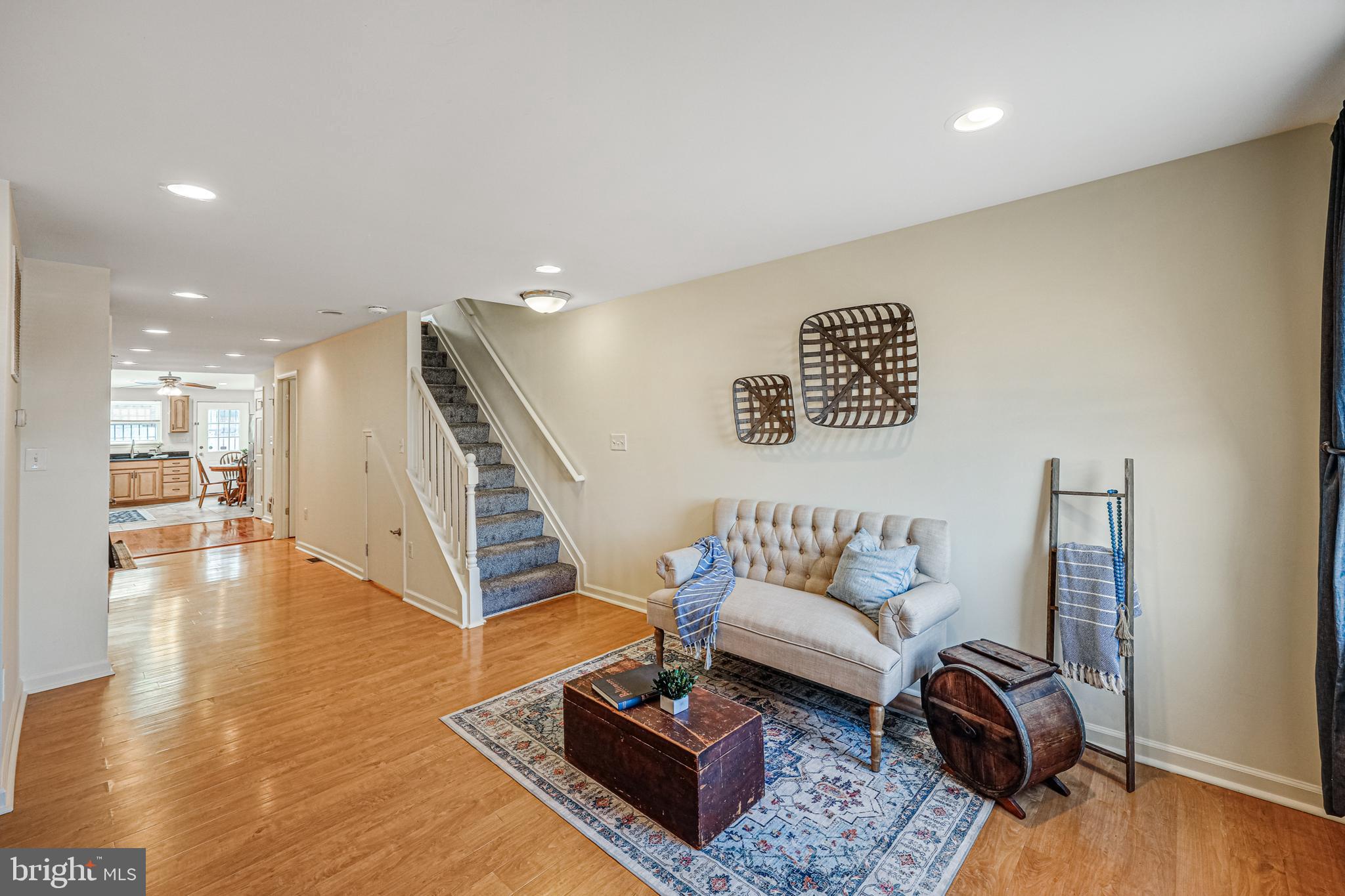 Welcome to 529 South Chester Street, a stunning three-story home nestled in the vibrant community of Upper Fells Point. This charming residence boasts three spacious bedrooms and 2.5 baths, offering ample space for your entire household. As you step inside, you'll be greeted by the main level's inviting open concept living and dining areas, adorned with beautiful hardwood flooring. With recessed lighting in most rooms, the home exudes a warm and welcoming ambiance. The Dining Room offers a granite breakfast bar and opens to the large gourmet kitchen. Create delicious meals in the kitchen featuring granite counters and stainless-steel appliances, including gas cooking. The main level also includes a convenient half bath and access to a rear patio, perfect for outdoor relaxation. On the first upper level, you'll find two well-appointed bedrooms and a bath with a large walk-in shower and gorgeous tile surround. The second upper level is a private retreat, featuring the third bedroom with a walk-in closet, a full bath with a step-in shower, and a cozy space ideal for a reading nook or home office. A unique spiral staircase leads to the rooftop deck, where you can enjoy breathtaking views of the city skyline. This home is ideally located near leisure and recreation areas, including nearby Patterson Park, Canton Waterfront Park and Upper Fells Point Community Garden which offer serene green spaces to unwind. Shopping & Dining enthusiasts will appreciate the proximity to local shops and restaurants. With its prime location and exceptional features, 529 South Chester Street is a perfect place to call home. Don't miss the opportunity to make this beautiful property yours!