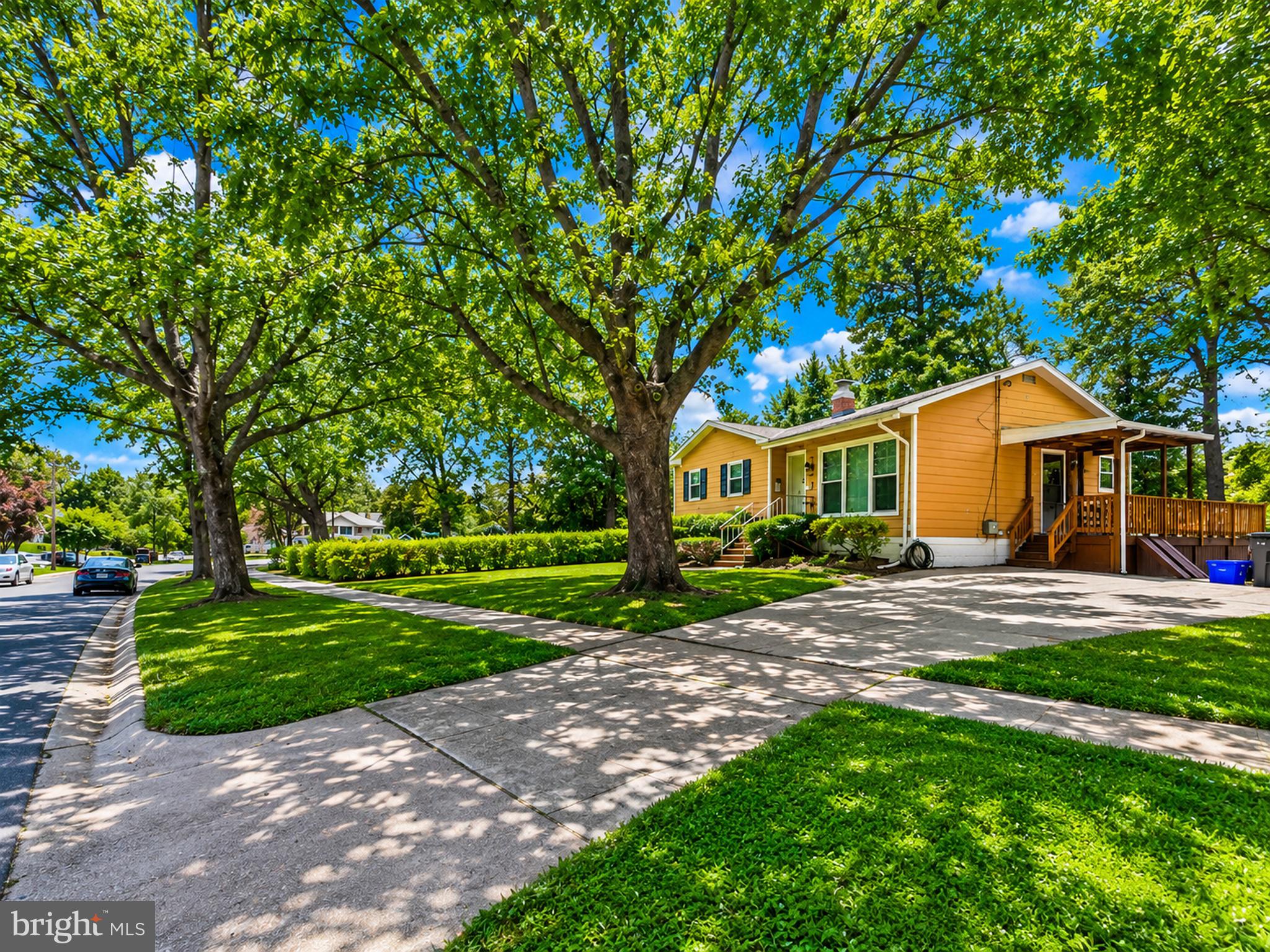 This beautifully renovated and well-maintained single-family home is ideally located in the heart of Rockville and offers the perfect combination of comfort, convenience, and modern upgrades. Situated on one of the largest corner lots in the neighborhood, this property features a private, level, fully fenced backyard surrounded by mature trees and landscaping, perfect for entertaining, gardening, or simply relaxing.

Enjoy an unbeatable location within walking distance of the Aspen Hill Library and Aspen Hill Shopping Center, offering grocery stores, restaurants, coffee shops, salons, and everyday conveniences. Commuters will appreciate being just minutes from both Glenmont Metro Station (approximately 6 minutes) and Twinbrook Metro Station (approximately 11 minutes), with easy access to major commuter routes including MD-97 (Georgia Avenue), MD-185 (Connecticut Avenue), and the ICC (MD-200).

The main level features three spacious bedrooms with beautifully refinished hardwood floors, a fully remodeled bathroom, a bright and inviting living room, a separate dining room with a pantry, and a beautifully updated kitchen. The kitchen showcases a brand-new quartz countertop, a brand-new Samsung refrigerator, 42-inch cabinetry, newer appliances, and a functional layout designed for everyday cooking and entertaining. Sliding access leads to a renovated wood deck overlooking the expansive side yard and private backyard.

The finished lower level offers an impressive family room, a remodeled full bathroom with a Jacuzzi tub, an oversized walk-in closet, a massive laundry room with wall and base cabinetry, a utility room with extensive shelving, and a hidden workshop/man cave, providing exceptional flexibility and abundant storage. The generous lower-level layout also provides a variety of possibilities for multigenerational living, extended guest accommodations, or private living space for household members, allowing buyers to tailor the home to their own lifestyle needs.

With its spacious layout, extensive updates, outstanding location, and one of the neighborhood's largest lots, this home is an exceptional opportunity for buyers seeking move-in-ready living in one of Rockville's most convenient communities.