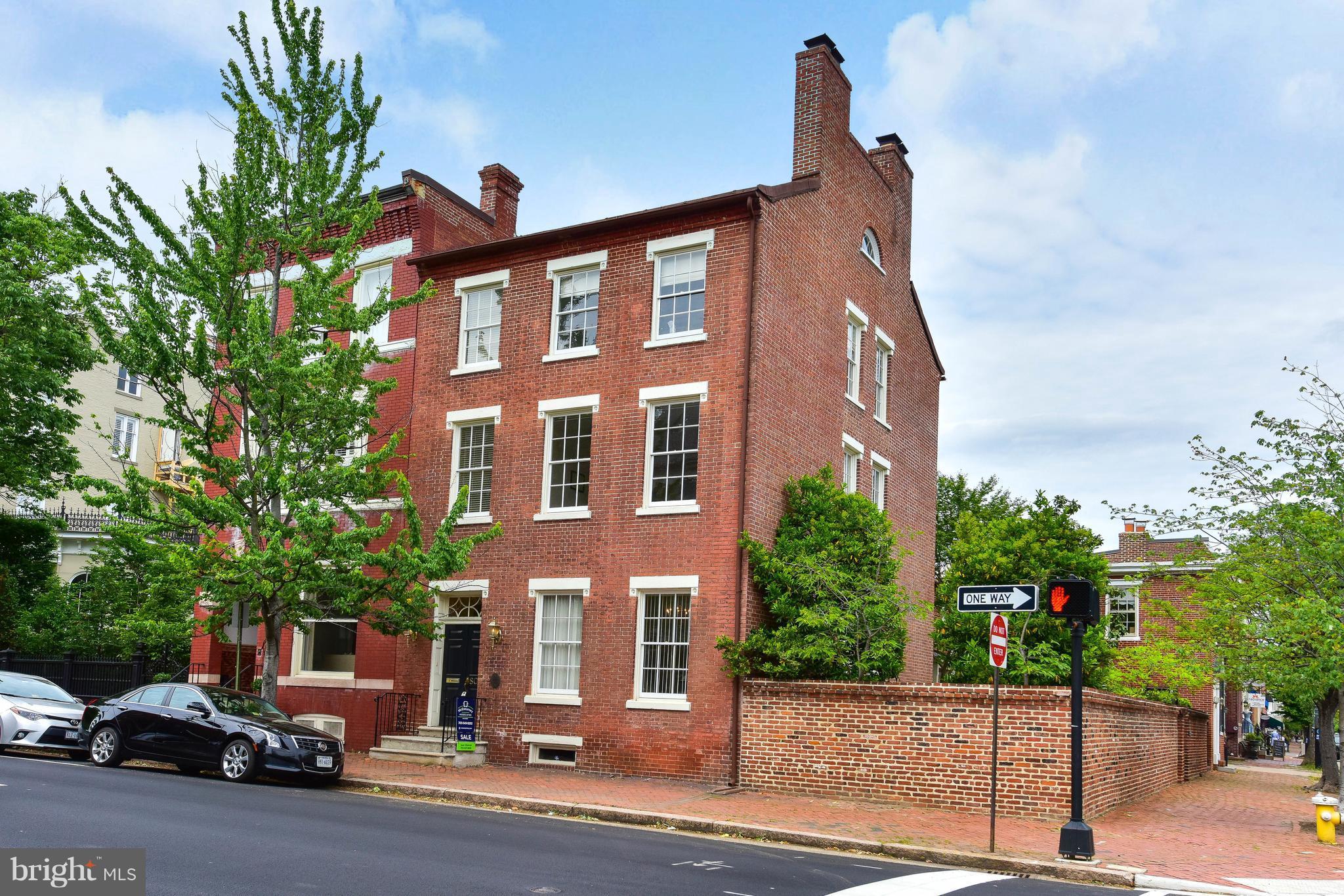 Fabulously renovated/updated historic property. Plaqued & built in 1810 by a wealthy ship captain this elegant property features 10-foot ceilings, original hardwood floors, gorgeous walled garden, one block to King Street/free trolley, 8 blocks to Metro.  5 fireplaces, 2.5 beautifully update baths. Grand front & rear staircases. Prince St. front entry, Columbus side entry ADA accessible.
