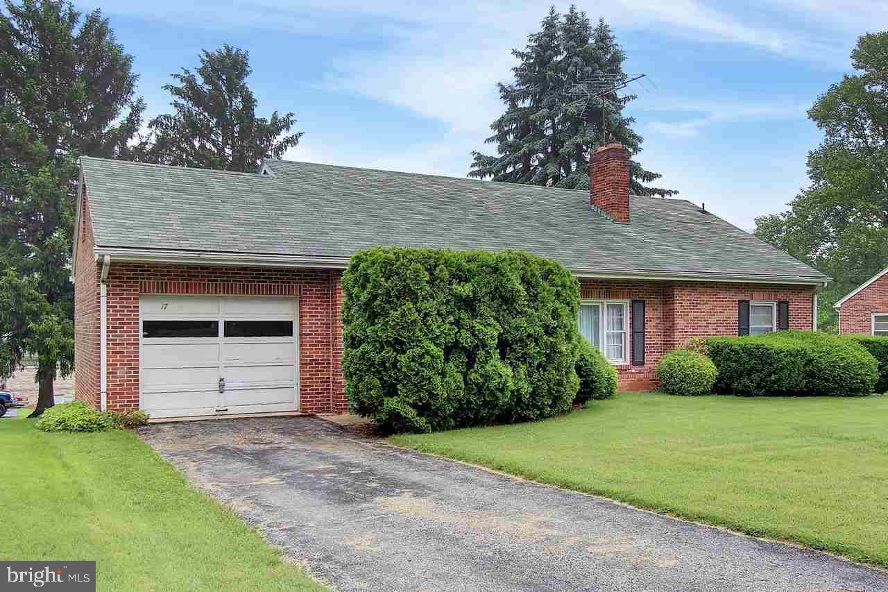 All brick rancher with hardwood floors and fresh paint throughout.  Sits on one of the side streets in Stewartstown with nice homes all around. Bedrooms are all nice size with HW and living room has wood burning fireplace.  Basement has a walkout and is just waiting to be finished with a den or family room.