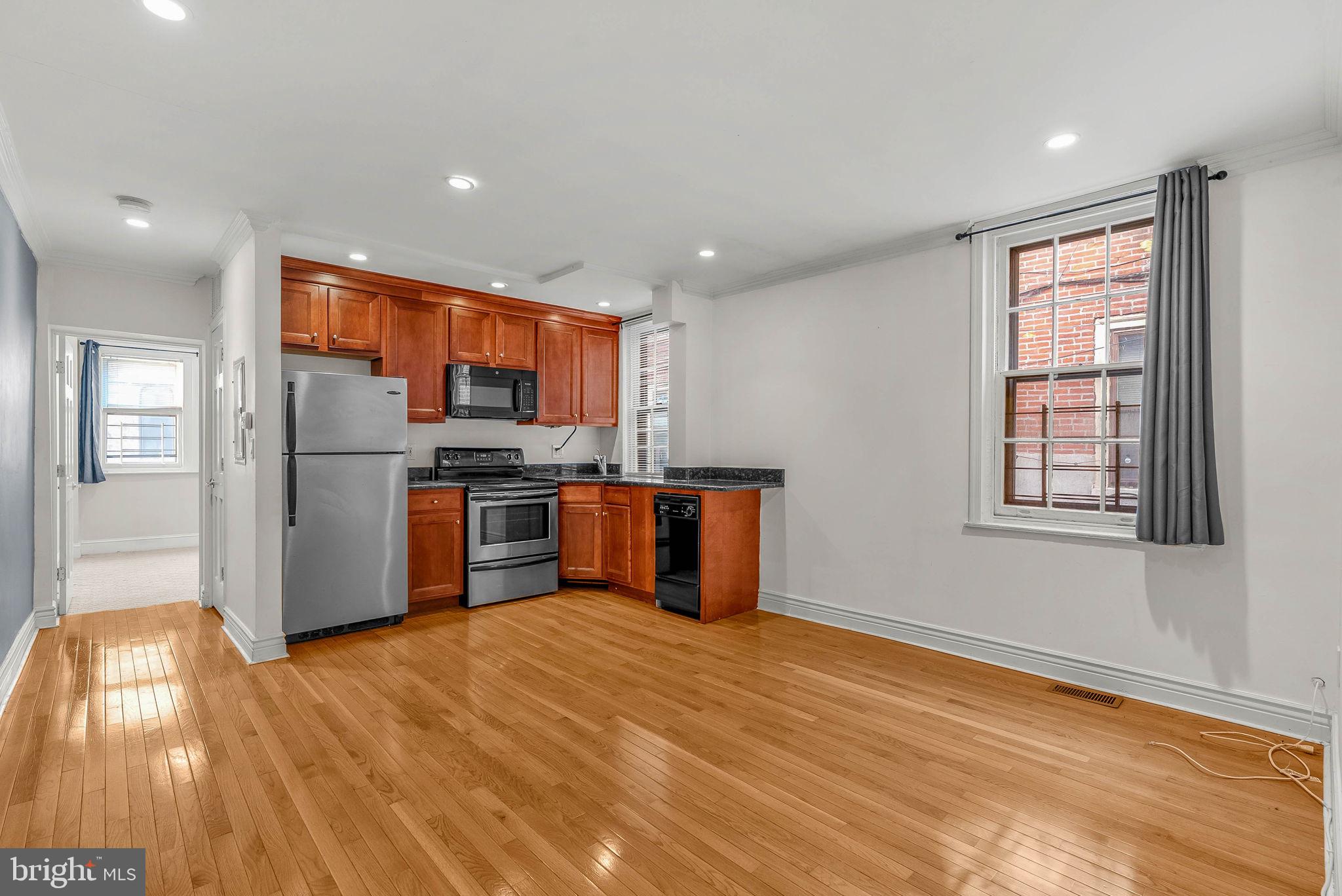 2-car parking on Fairmount Ave! Welcome to 1910 Fairmount Ave #B, a move-in ready 1-bedroom, 1-bathroom condo on historic Fairmount Avenue in the heart of the Fairmount neighborhood. Located directly across from Manong and surrounded by some of the area's best restaurants, cafes, and cultural attractions, this first-floor rear unit offers convenience and comfort in an unbeatable location.

Inside, you'll find hardwood floors, recessed lighting, crown molding, custom cabinetry, stainless steel appliances, and an open-concept living space. The spacious bedroom provides a comfortable retreat, while the landscaped private garden offers rare outdoor space in the city and leads directly to private parking large enough for 2 cars.

Additional features include central heating and cooling, basement storage, and on-site laundry. Whether you're looking for a place to call home or a great investment opportunity, this well-maintained condo is a fantastic opportunity in one of Philadelphia's most desirable neighborhoods.