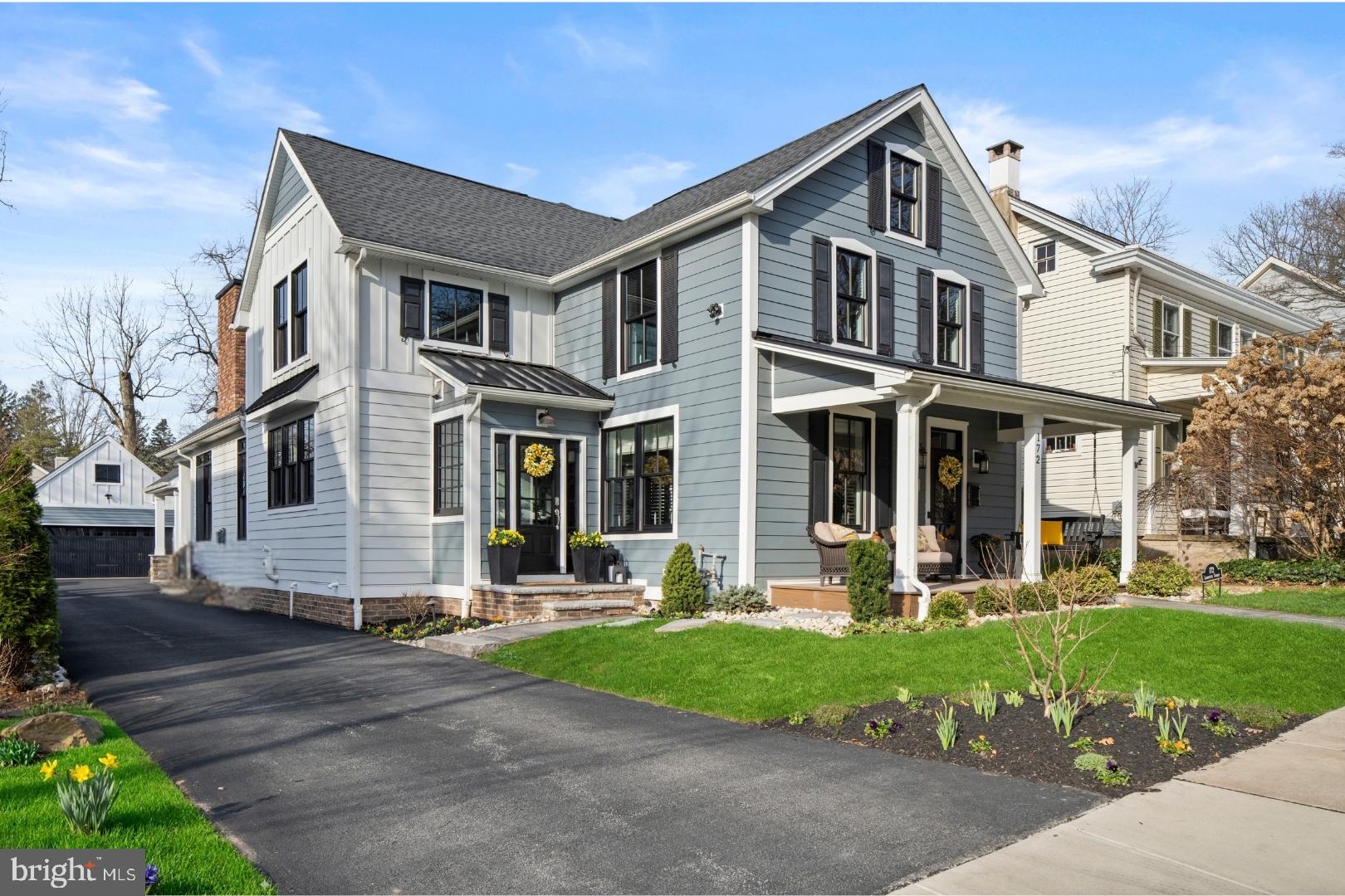 The Ultimate Doylestown Borough Modern Classic
Located in the heart of Doylestown Borough, this extraordinary 2020 rebuild stands in a class of its own. Taken down to the studs—preserving only the original basement and front façade—this home was masterfully reconstructed with exceptional craftsmanship, vision, and attention to detail. With nine variances secured to achieve its scale, layout, and amenities, this is a Borough property unlikely to ever be replicated.  A charming front porch welcomes you inside, where a refined private study anchors the entry. wide-plank engineered hardwood flooring flows throughout the main level, and the home’s historic character is honored with the beautifully preserved and restored 1870s original staircase.

The first floor opens into a spectacular open-concept living space where the gourmet kitchen seamlessly connects to the dramatic cathedral-ceiling great room. The kitchen is anchored by an oversized granite island and features a farmhouse sink, Thermador six-burner gas range, premium appliances, custom cabinetry, a spacious walk-in pantry, dry bar with beverage center, powder room, and plantation shutters throughout the first floor. The adjoining great room is highlighted by a striking floor-to-ceiling masonry gas fireplace and expansive black-framed windows and doors that flood the space with natural light, creating an inviting environment designed for gathering and everyday living.

Designed for practical Borough living, the home also offers a rare second front entrance leading directly into a beautifully finished mudroom, along with a true first-floor laundry room and abundant storage throughout.  The first-floor primary suite provides both privacy and convenience, featuring two large closets and a beautifully appointed spa-inspired bath. Upstairs, three additional bedrooms, a spacious hall bath, storage room, and large attic provide flexible space for family and guests.

Just beyond, a covered custom patio extends the home’s living space outdoors. An expanded terrace with a fully appointed outdoor kitchen and its own masonry fireplace creates the perfect setting for year-round entertaining and effortless indoor-outdoor living. Relax by the fire on the covered outdoor terrace overlooking the fenced yard. Additional features include a two-car garage with expanded storage space, a large storage area above the garage, and ample driveway parking for multiple vehicles.

All of this within walking distance to Doylestown’s acclaimed restaurants, boutiques, and cultural attractions, offering the charm of Borough living with the scale, openness, and modern amenities rarely found in town. A truly rare Borough offering—rebuilt beyond replication.