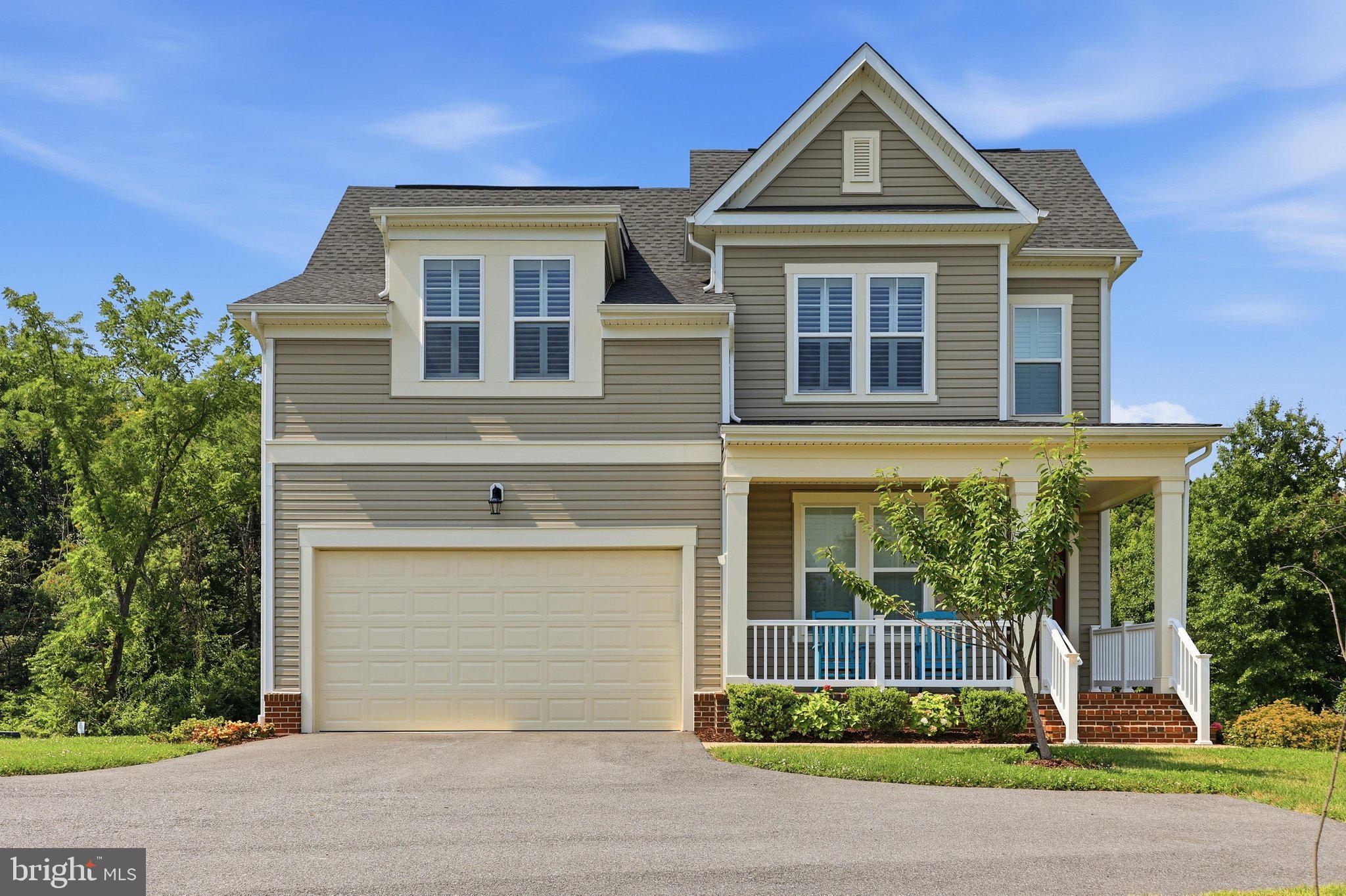 You will love the open floor plan of this beautiful five bedroom, four and one half bathroom home featuring a sophisicated floor owner's suite on the main level.  First, take a moment to relax on the porch and think of seasonal views.  Enjoy the trees providing a gentle summer breeze.  Imagine the spectacular colors of fall, envision Sugarloaf Mountain during the winter and know it all starts again in the spring. This lovely home backs to  forest reserve and  is adjactent to Parkland . Come on in and start placing your furniture.  Perhaps, you will use the room to your left as an office or library.  Continue and you will discover this wonderful home is both an entertainers' and family delight.  The gracious open floor plan is perfect for family and friends.  Fall in love with your chef's delight kitchen highlighted by beautiful cabinetry, double ovens and gas cooktop, an expansive center island , quartz countertops throughout, dazzling backsplash, stainless steel appliances, beautiful pedestal and recessed lighting, and walk-in pantry and dining area all leading to a lovely living area and deck.   The stunning  Plantation shutters are throuhout the home.  The beautiful king sized primary suite is steps away and affords plenty of natural lighting , two  walk-in closets,  room for a seating area and leads to your spacious owner's bathroom.
Upstairs you enjoy the view from the overlook  which leads to three additional bathrooms and two full baths.  The lower walk-out lower level features another king-size bedroom, a full bathroom , a recreation room which easily would fit a pool table, a game area and spacious sitting area perfect for a large television.  Of course there is ample storage room,  utility and another finished room .  Welcome home!